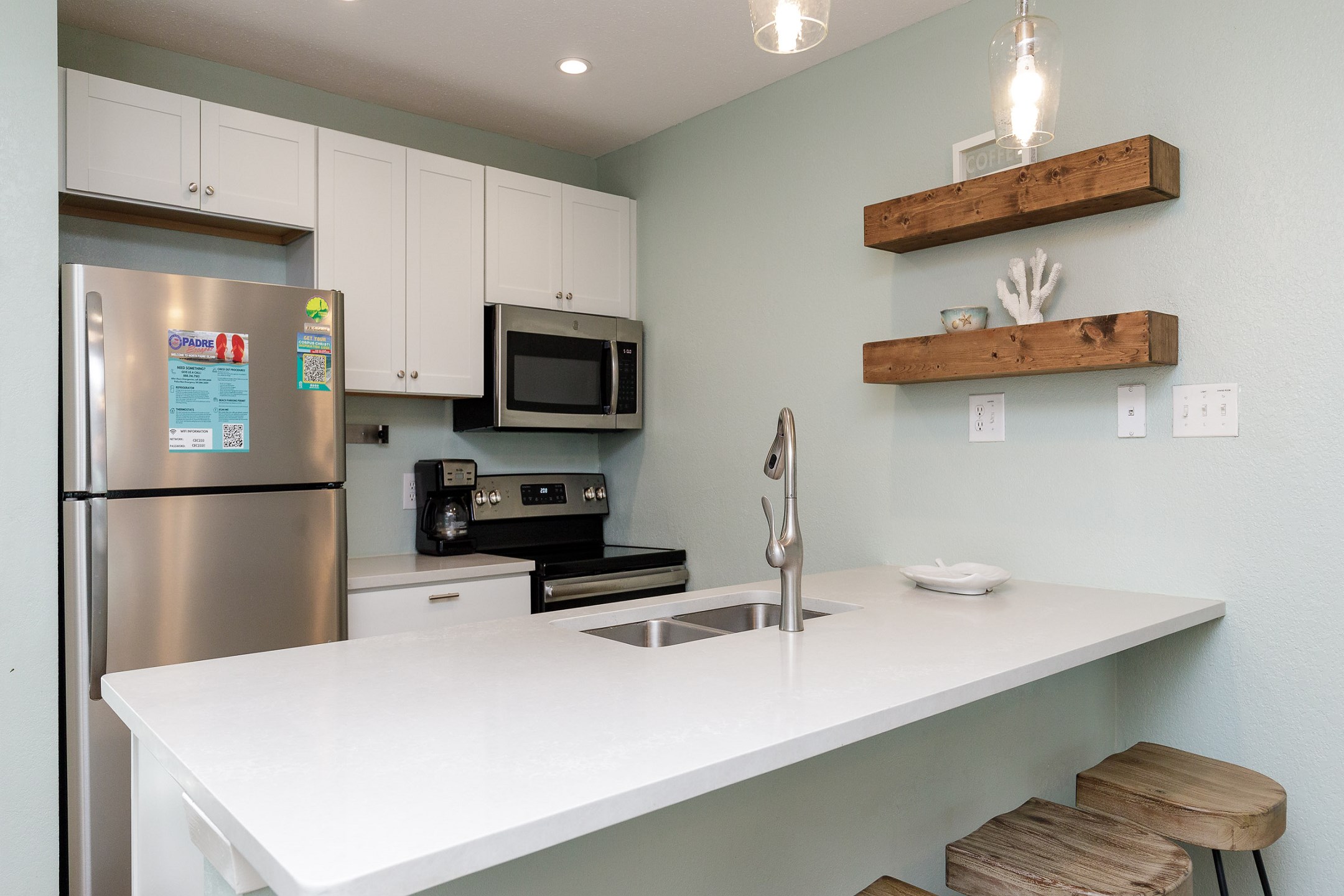 Fully equipped kitchen with stainless steel appliances 