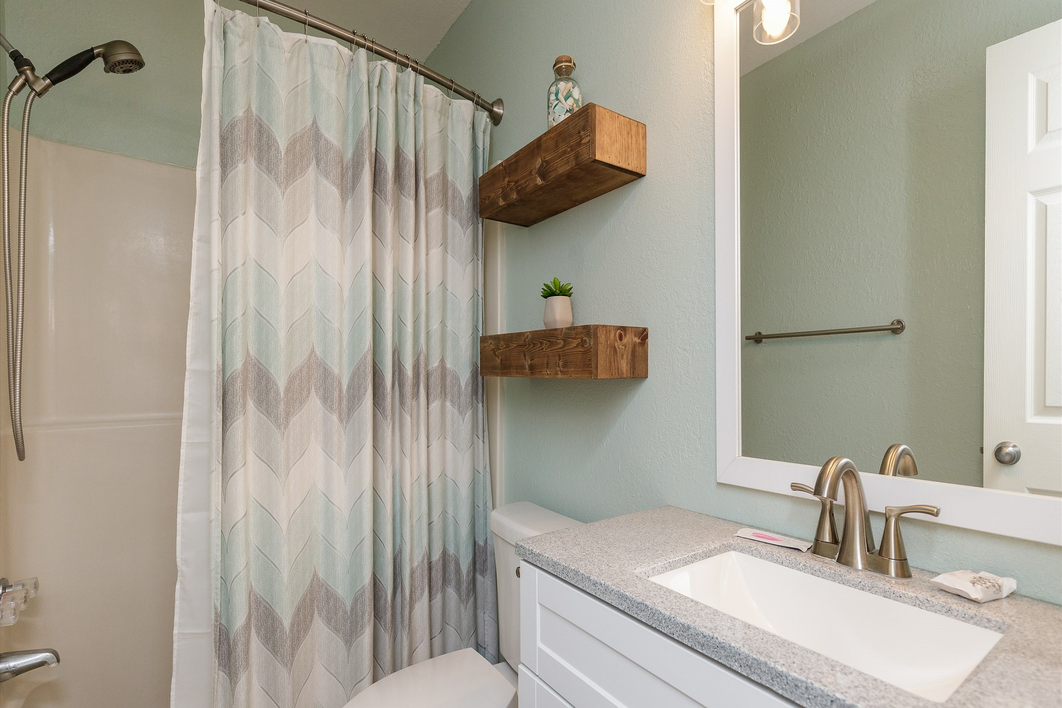 Master bathroom with tub and shower 