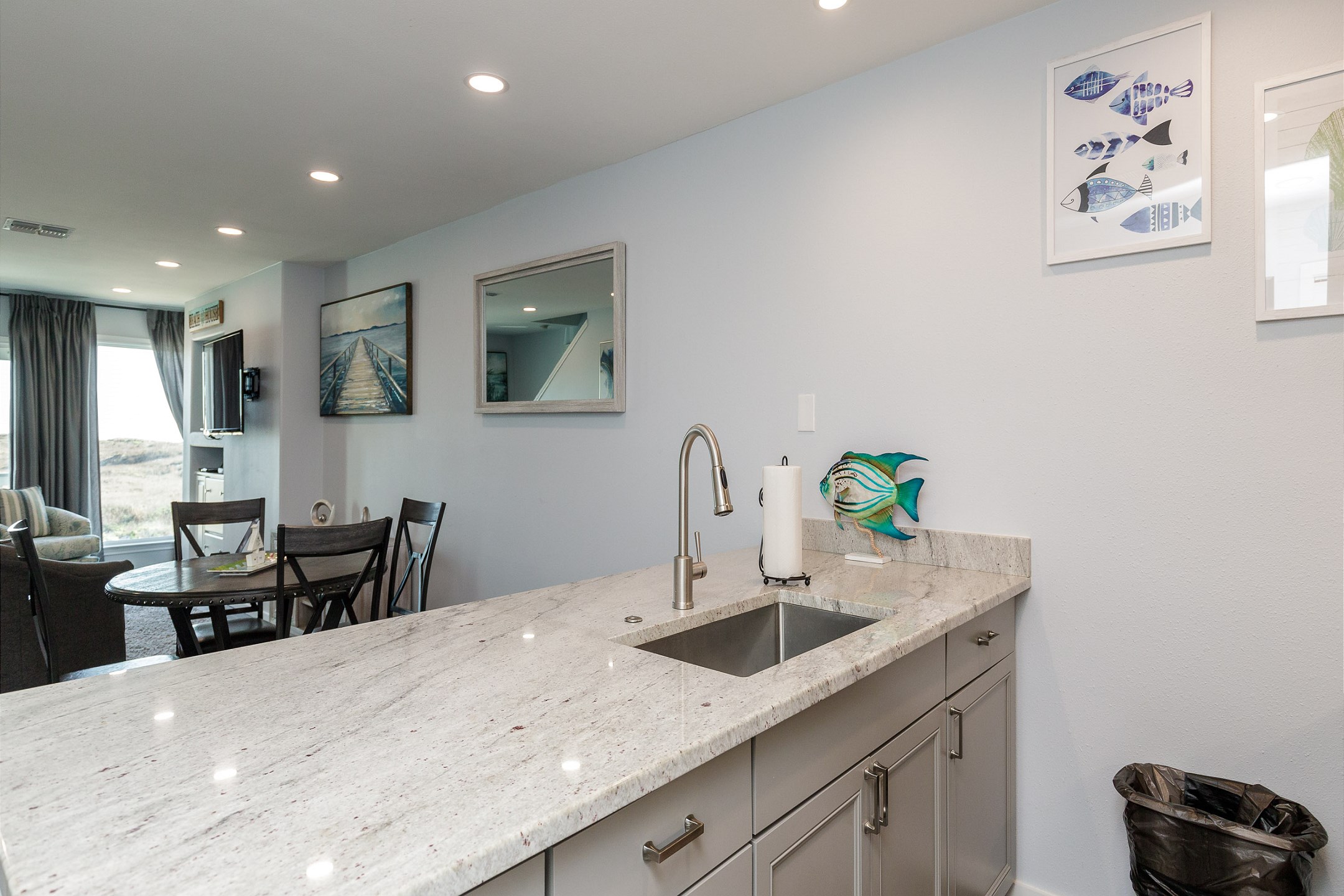 Coffee maker, toaster, cookware, dinnerware, and other kitchen essentials provided