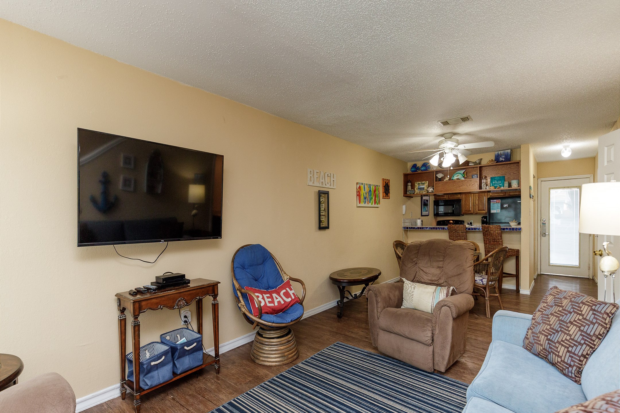 Spacious living with flat screen TV to catch up on your favorite shows