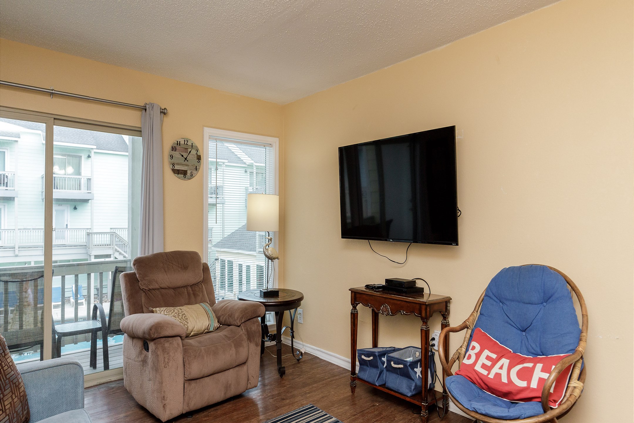 Comfy living space with flat screen TV to enjoy while gathering with the family 