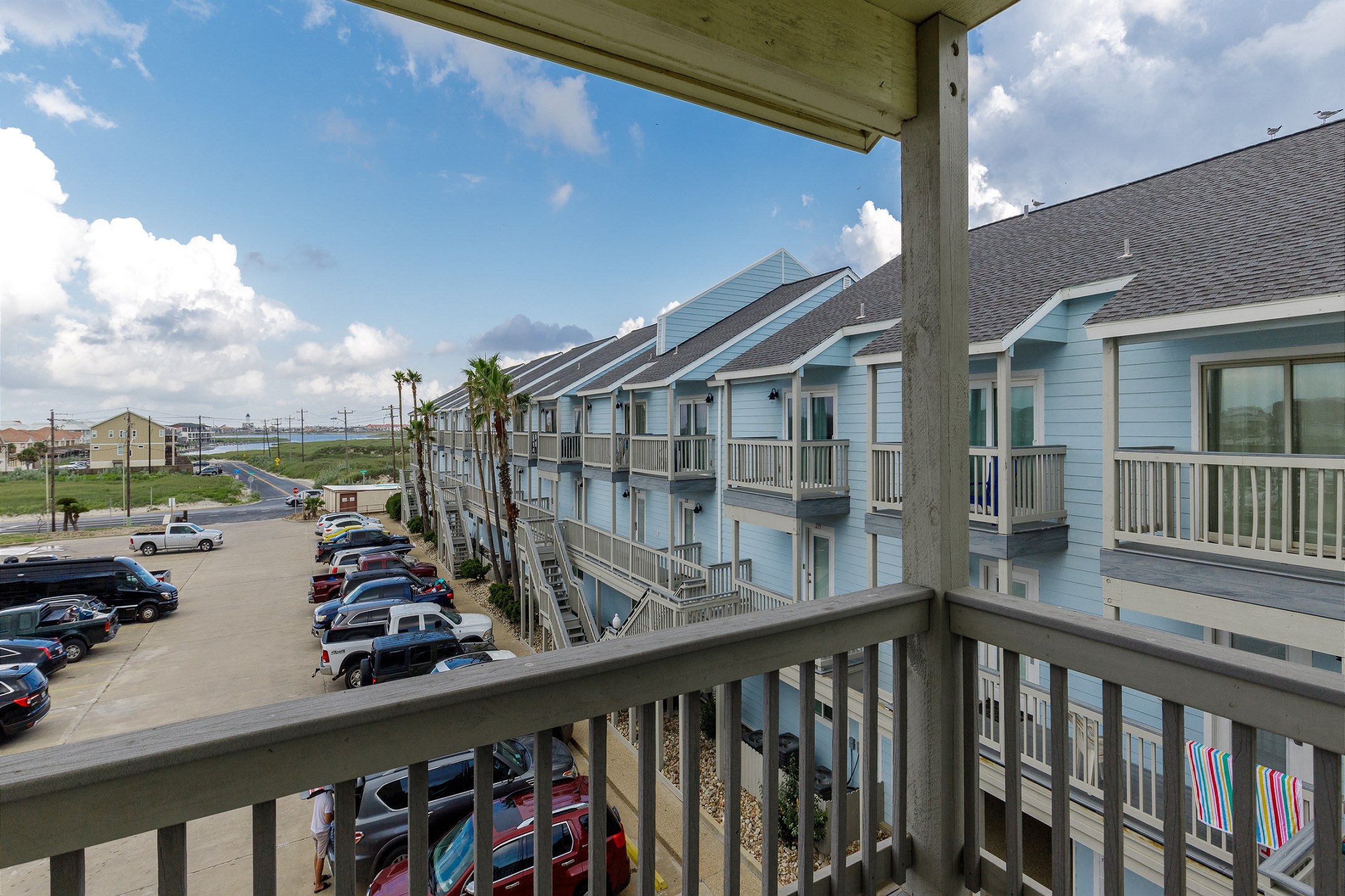 Private balcony off the second bedroom with parking lot view
