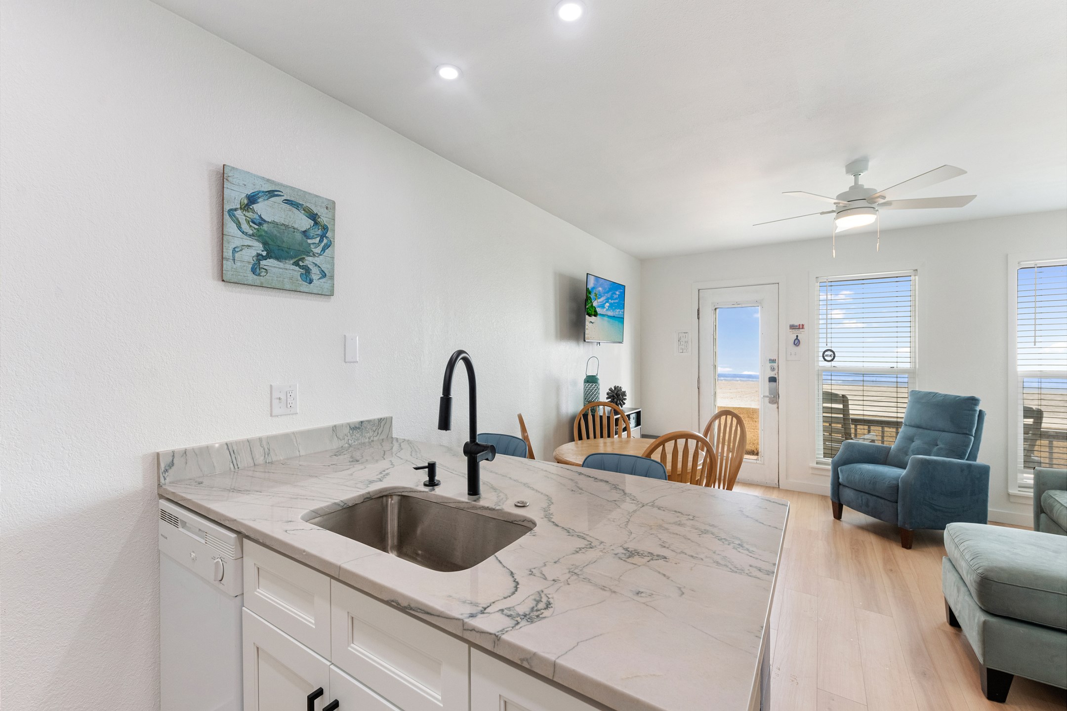 Remodeled kitchen space that opens up into the living area to gather with the family 