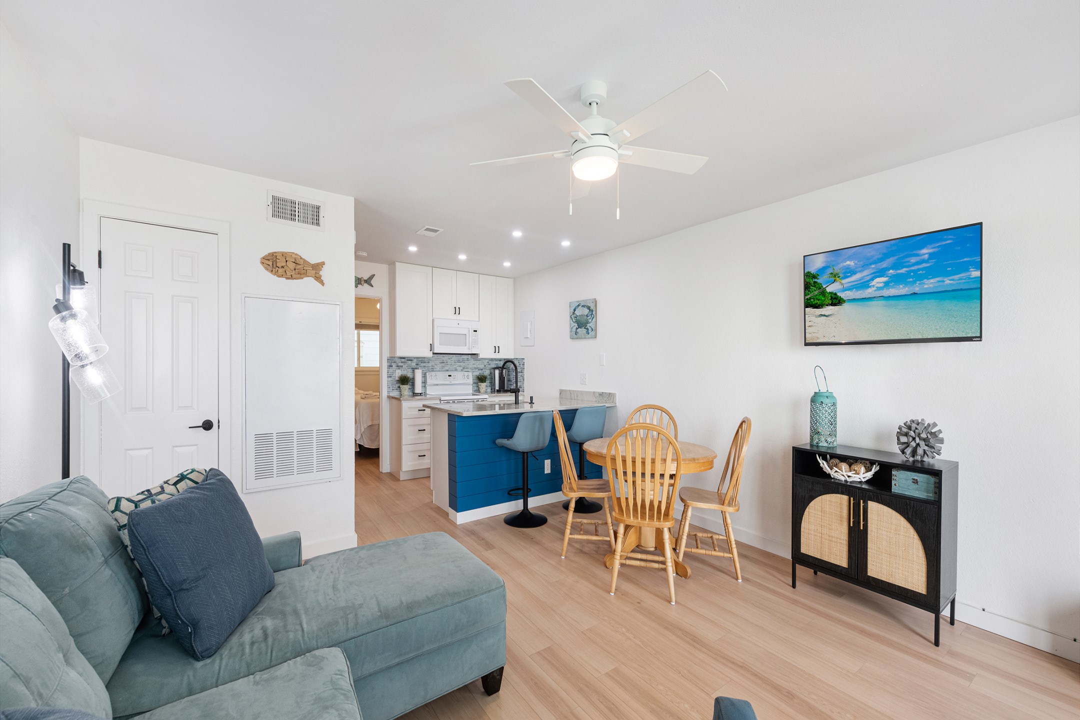 Great space to unwind with the family with new flooring, while the living space offers a sleeper sofa for additional guests