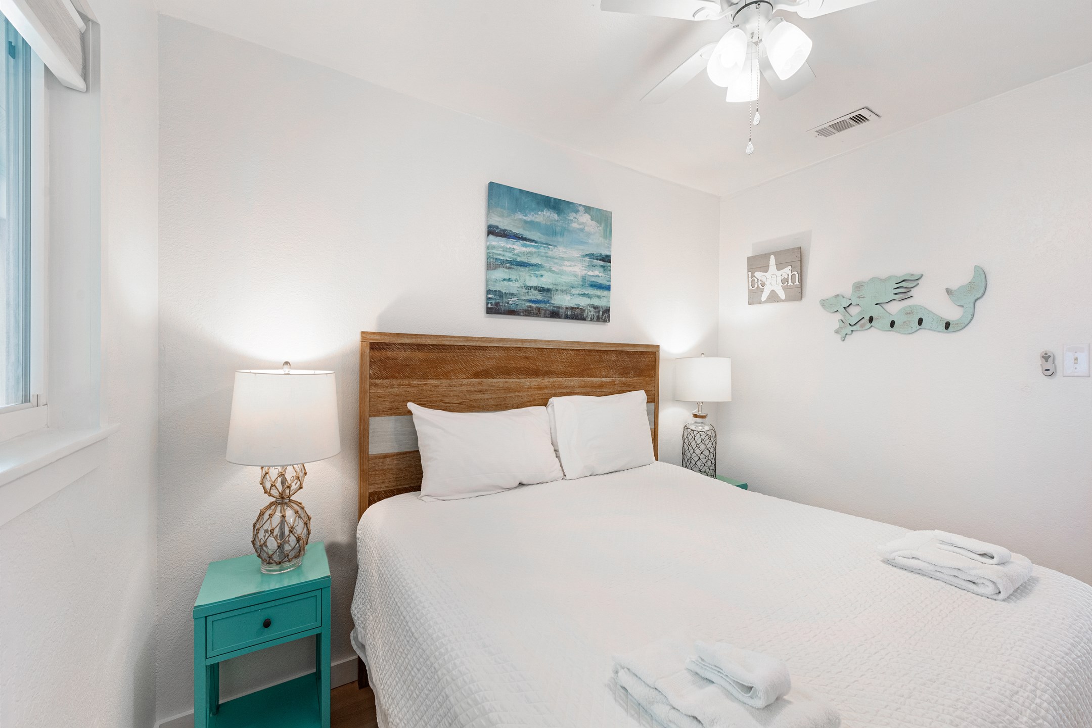 Master bedroom with king size bed and flat screen TV