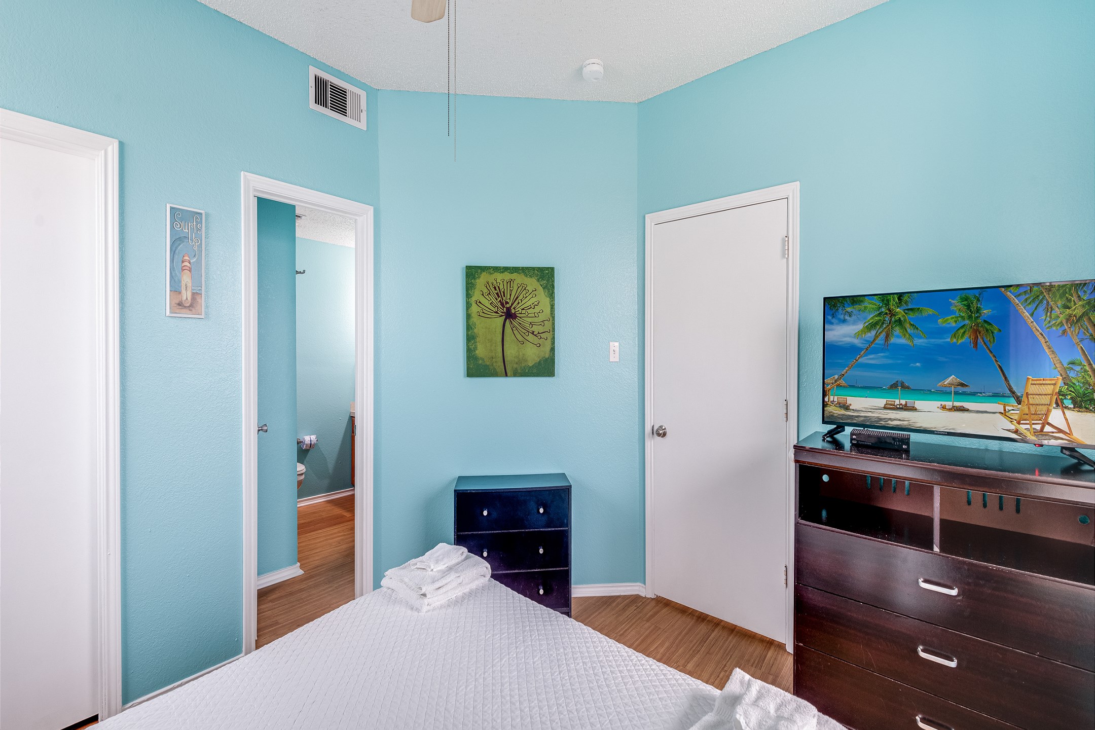 Sleep soundly in your private bedroom with a queen-size bed