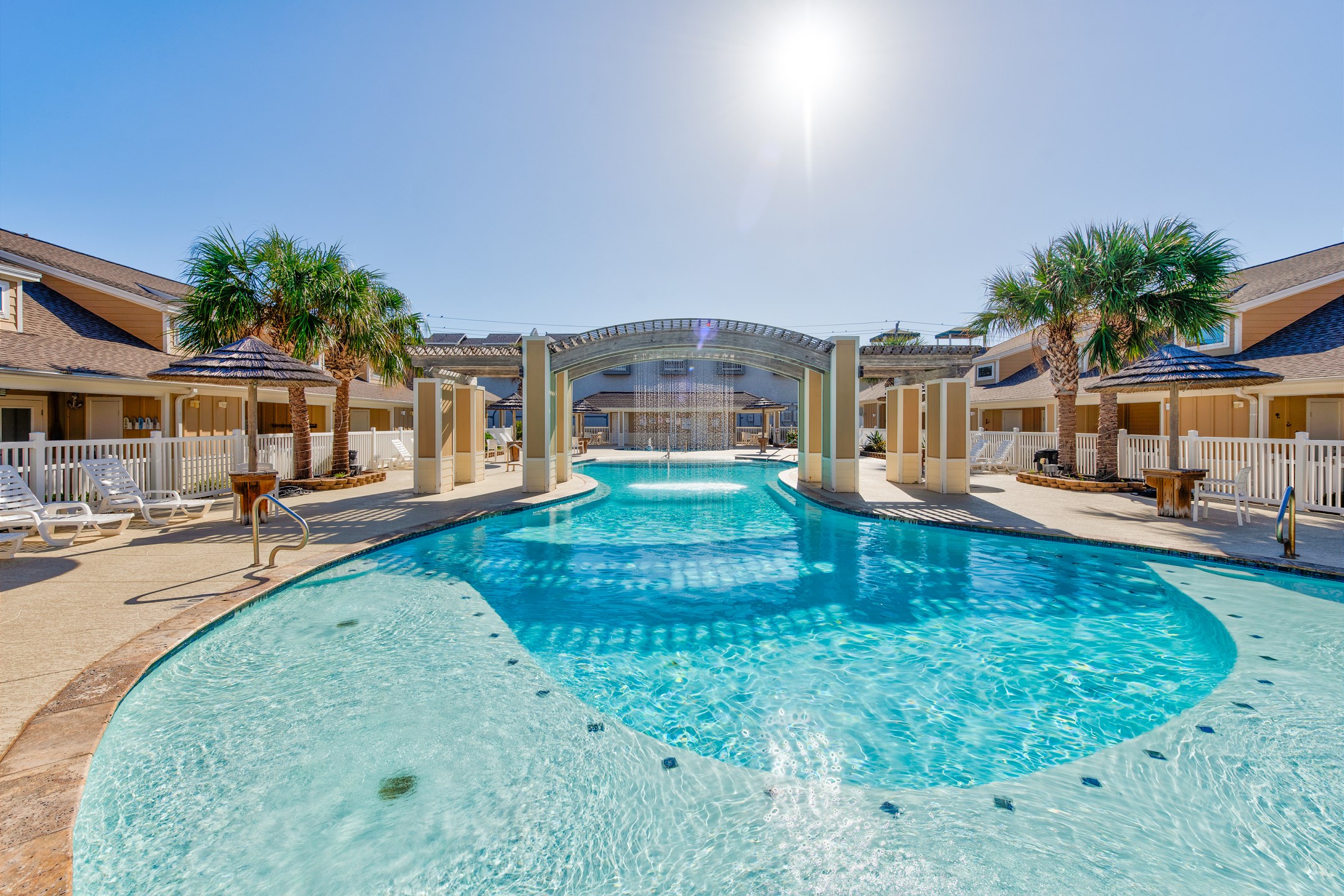 Cool off in elegance and experience tranquility poolside in the comfortable loungers