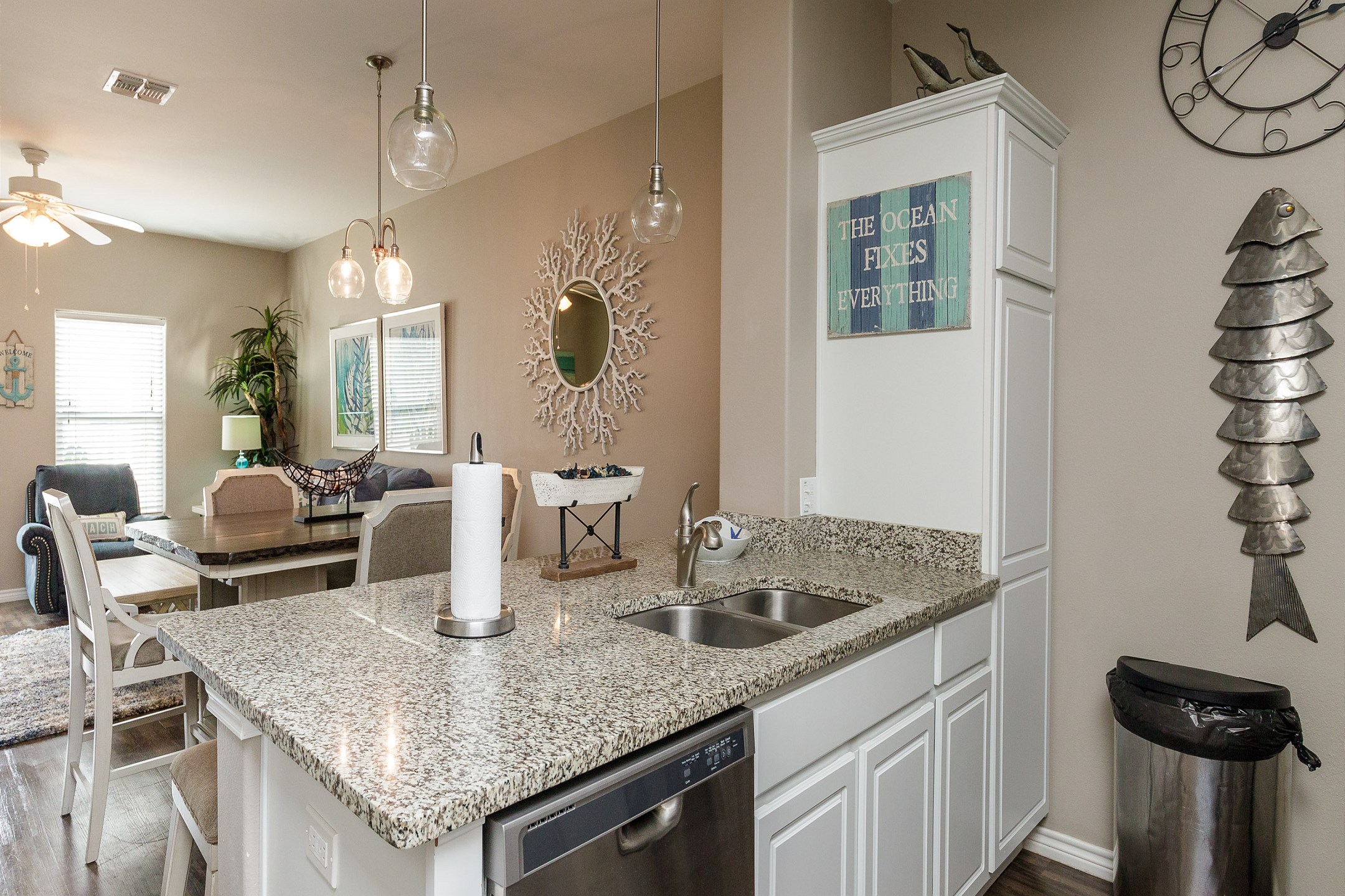 Open-concept layout connecting the dining area to the kitchen