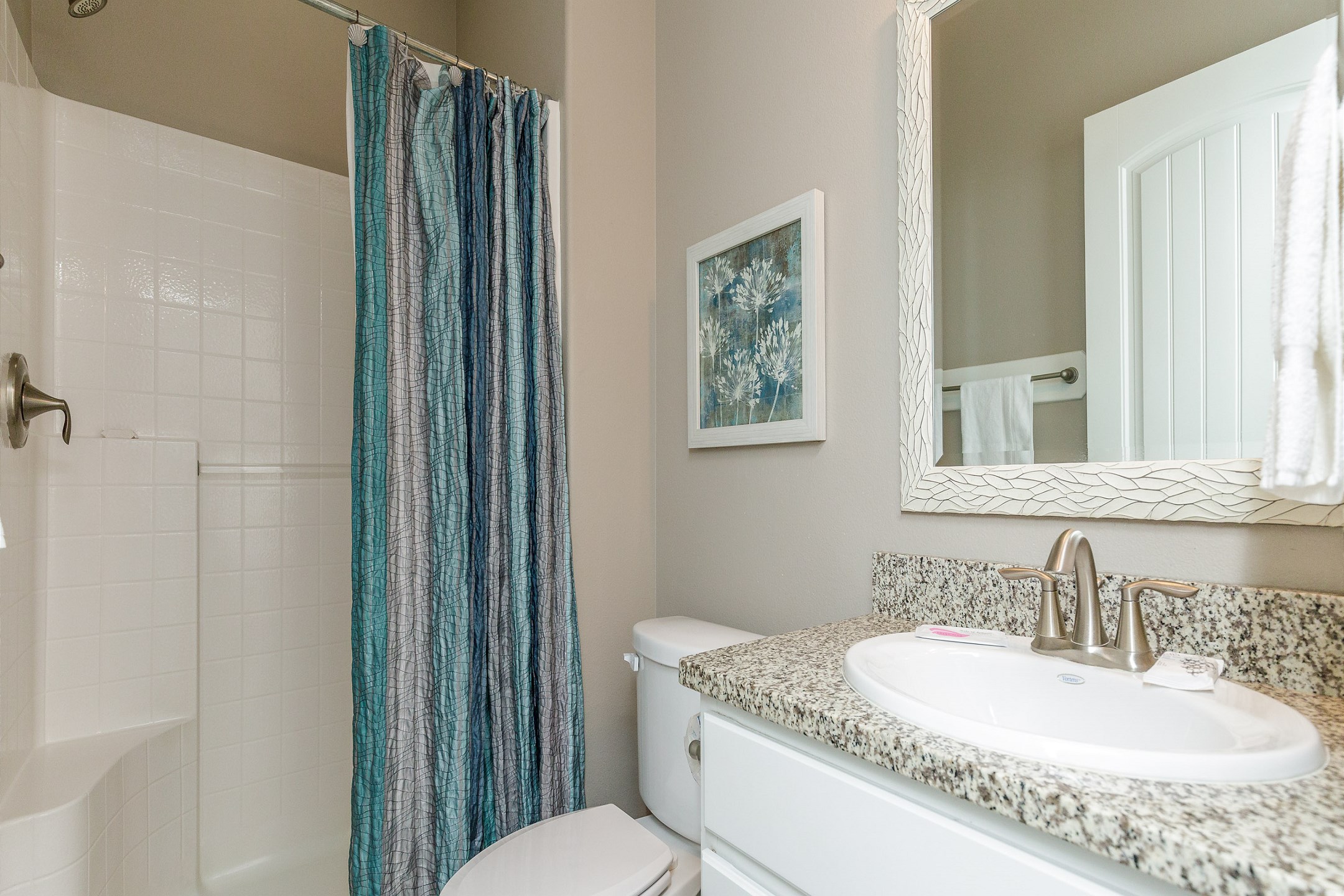 Guest bathroom on the first floor with walk in shower 