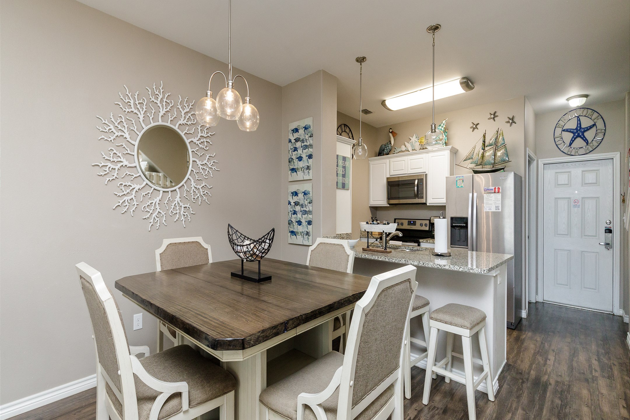 Share meals and laughter in the stylish dining area, enhanced by the coastal ambiance