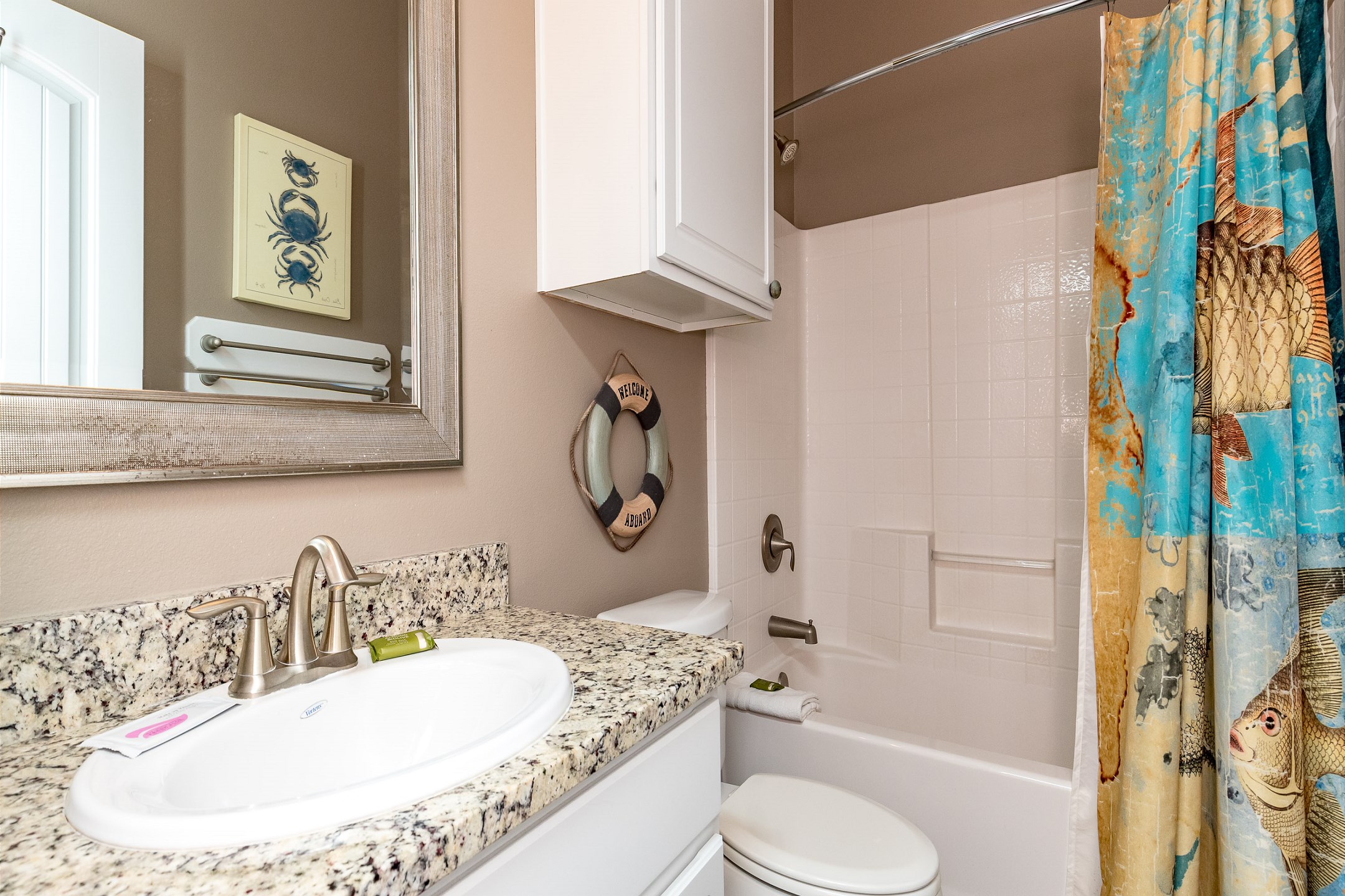 Master bathroom on the second floor with tub/shower combo