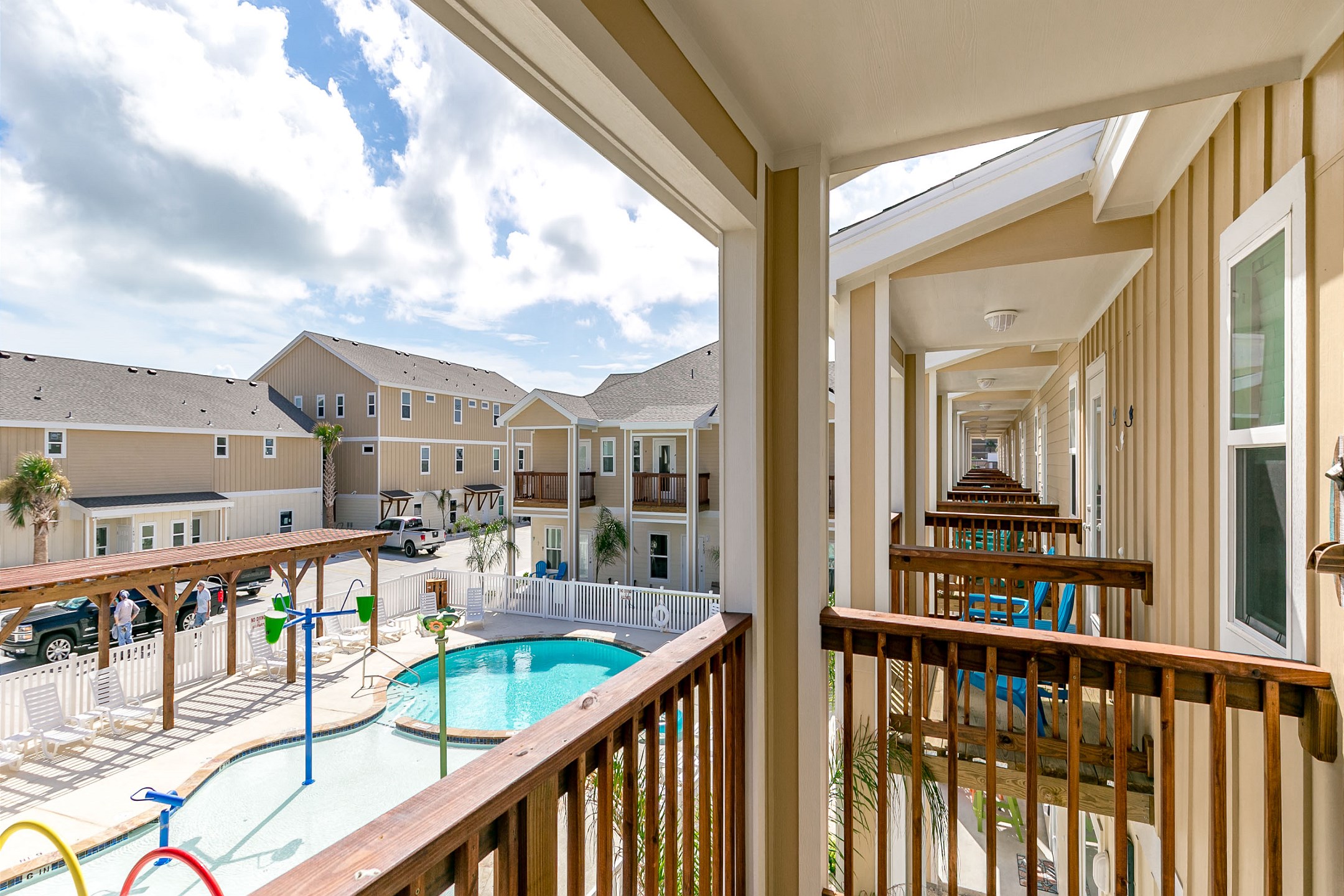 Balcony off the guest bedroom that overlooks the pool and playground