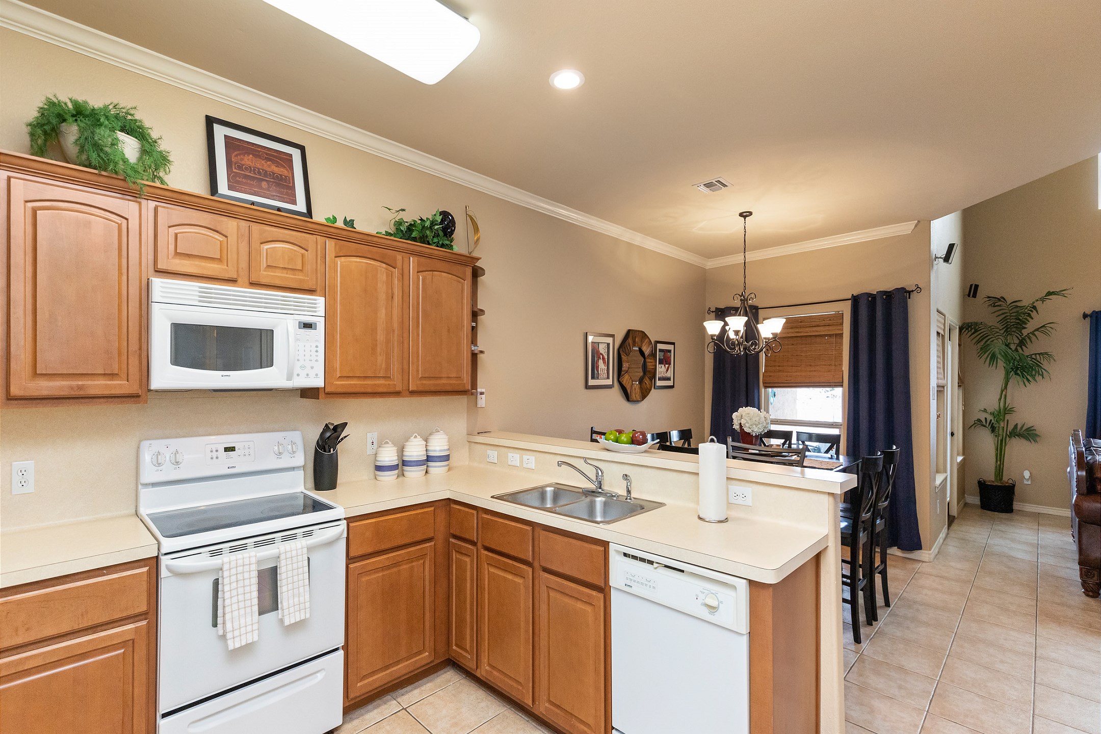 Open-concept layout connecting the dining area to the kitchen