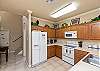 Fully equipped kitchen with ample counter space and 12-cup coffee maker 