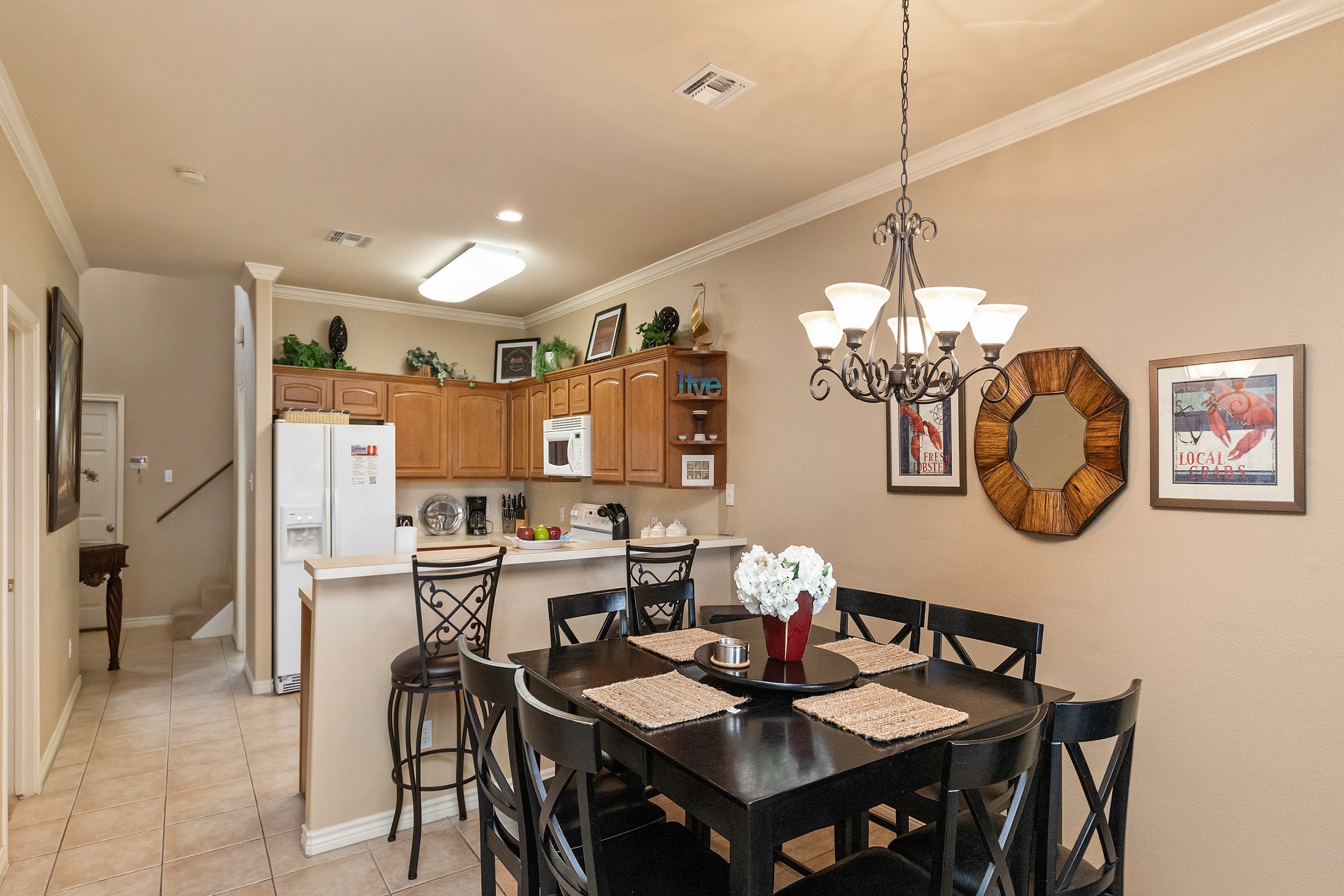 Open-concept layout connecting the dining area to the kitchen