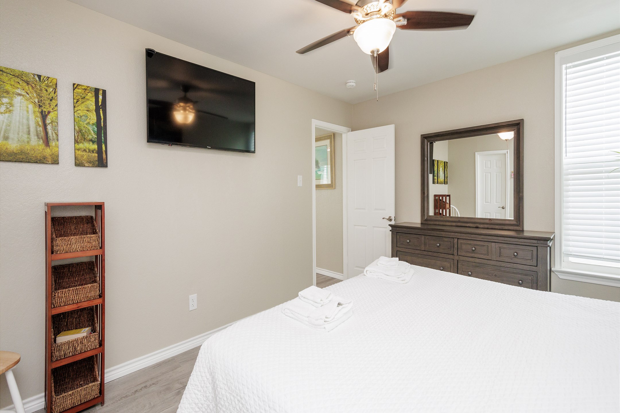 Master bedroom with king size bed, ensuite bathroom and flat screen TV 