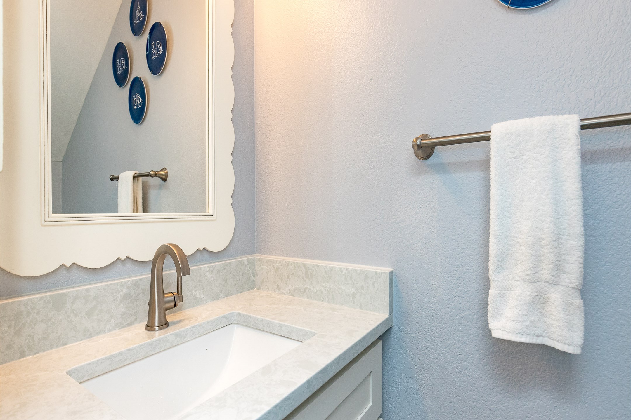 Updated first floor half bathroom with new counter tops