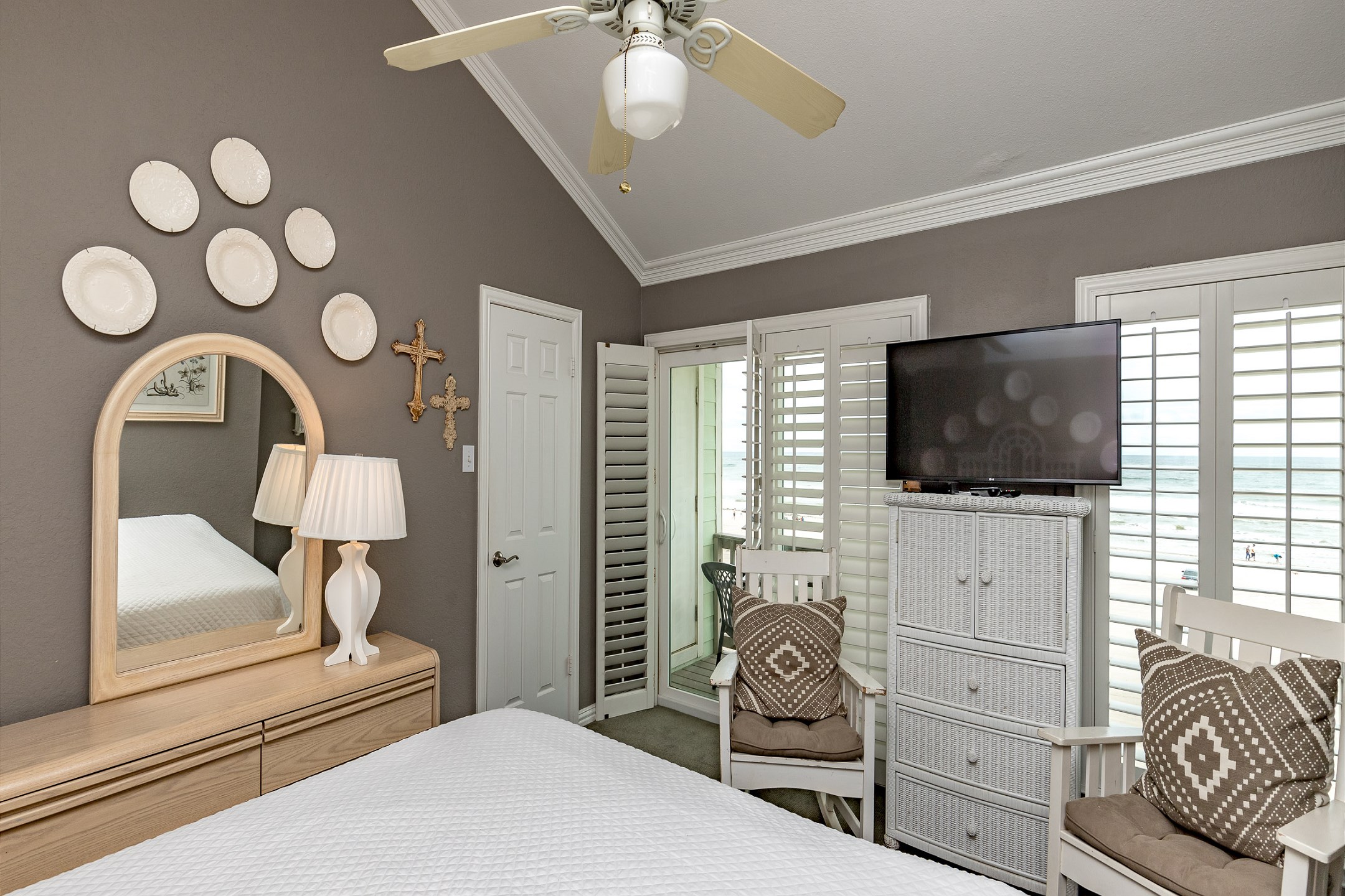 Master bedroom on the second floor with king size bed, ensuite bathroom, private balcony and flat screen TV