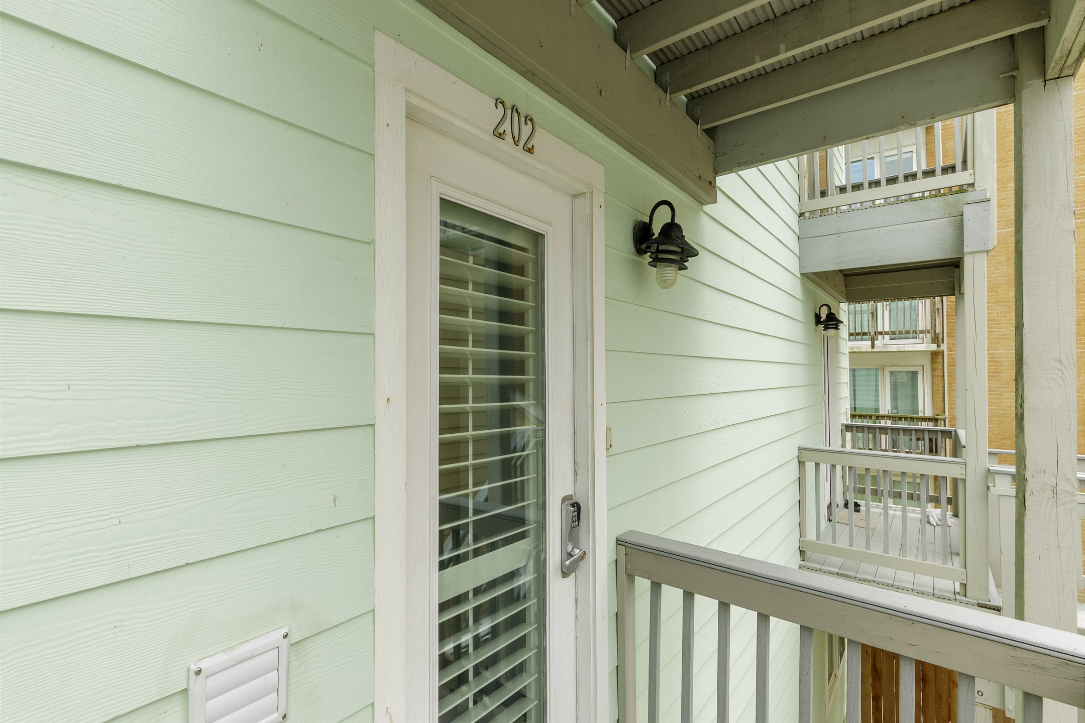 Front door entrance with coded lock for extra security 