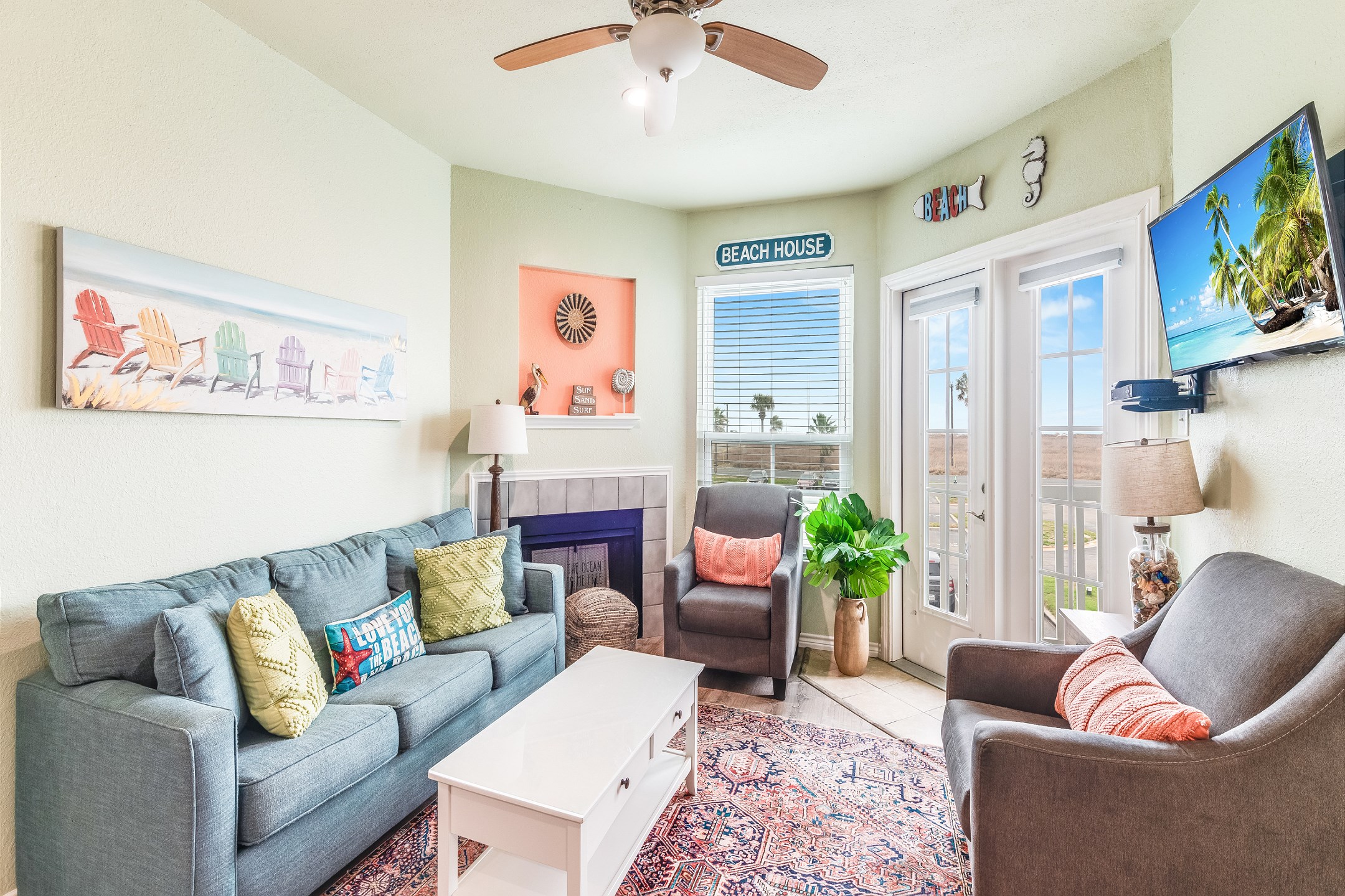 Spacious living, kitchen and dining area with beach features to unwind on your vacation