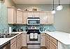 Spacious kitchen with stainless steel appliances 