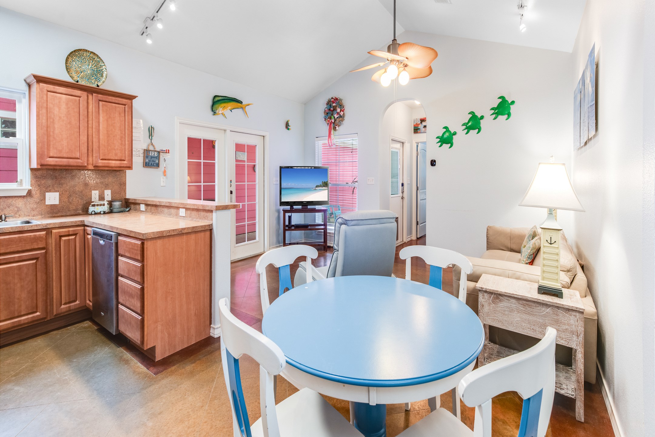 Open concept dining, kitchen and living space to enjoy meals and relax together