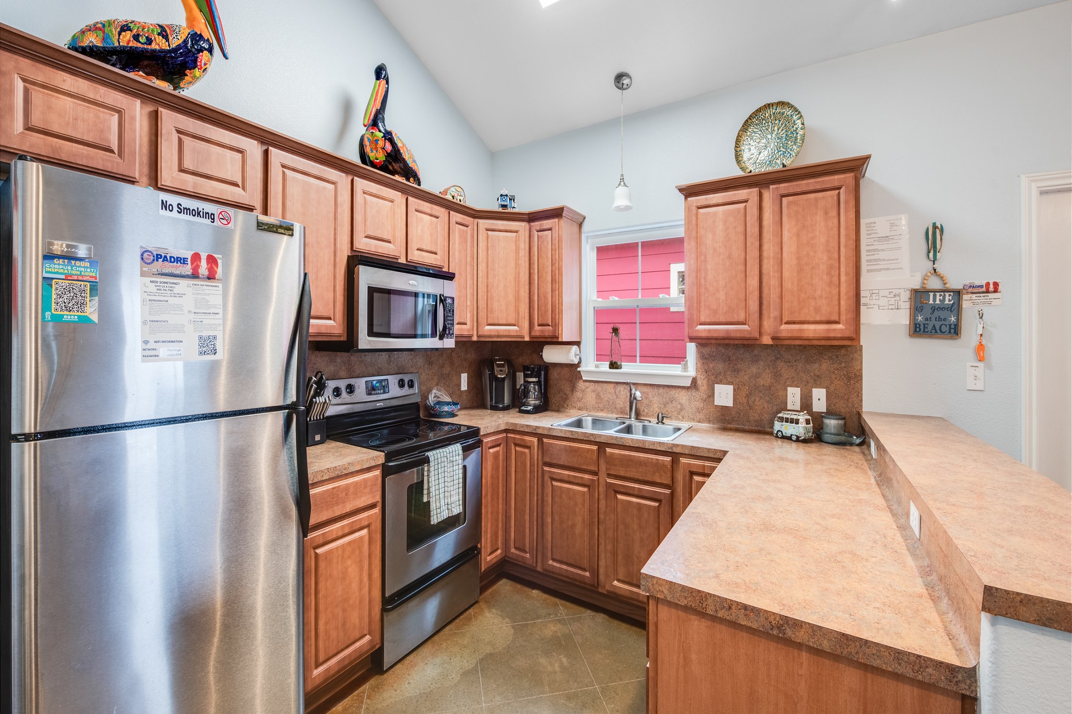 Modern kitchen with stainless steel appliances and plenty of counter space for prepping meals
