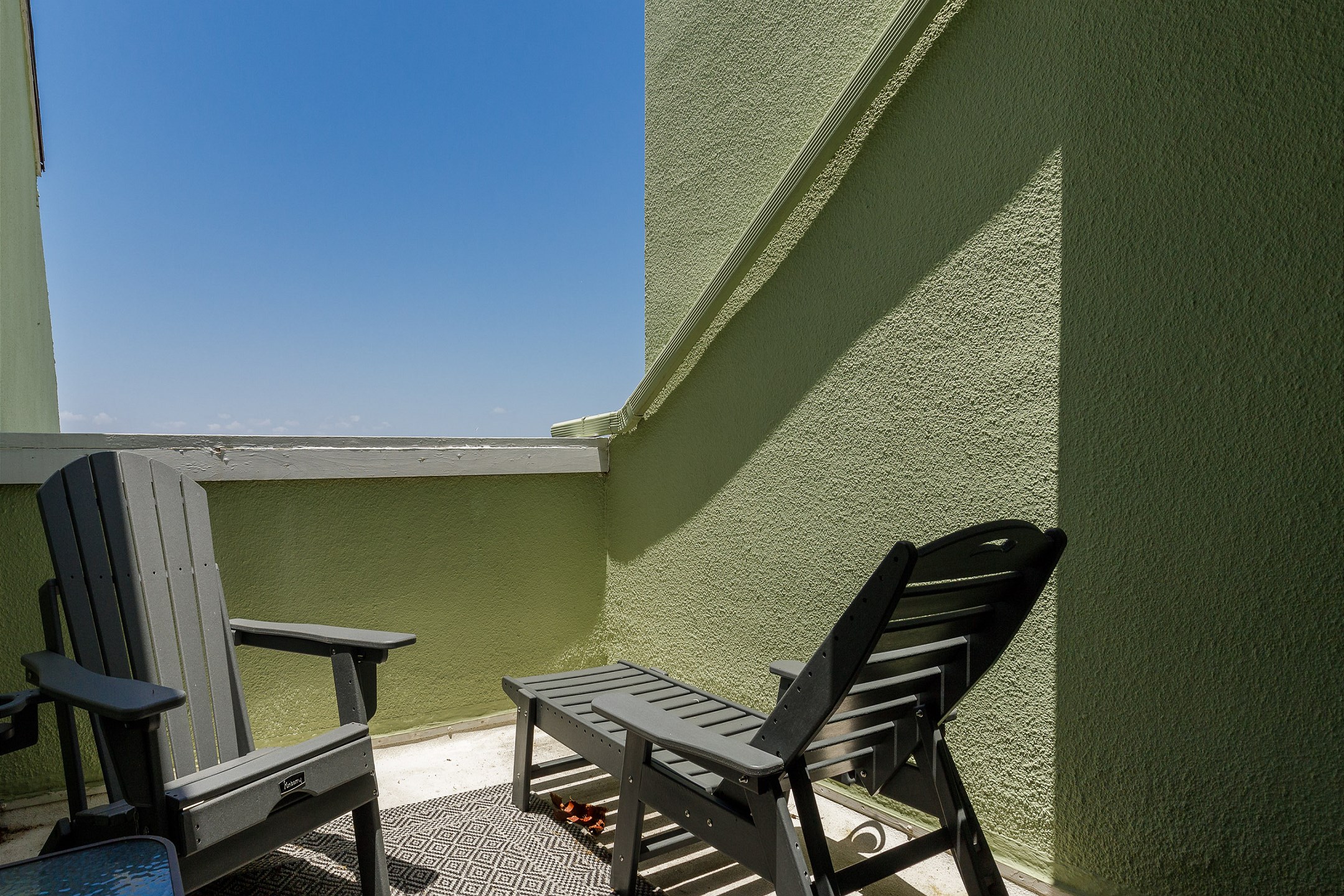 Private balcony off the master bedroom with a view of the canal