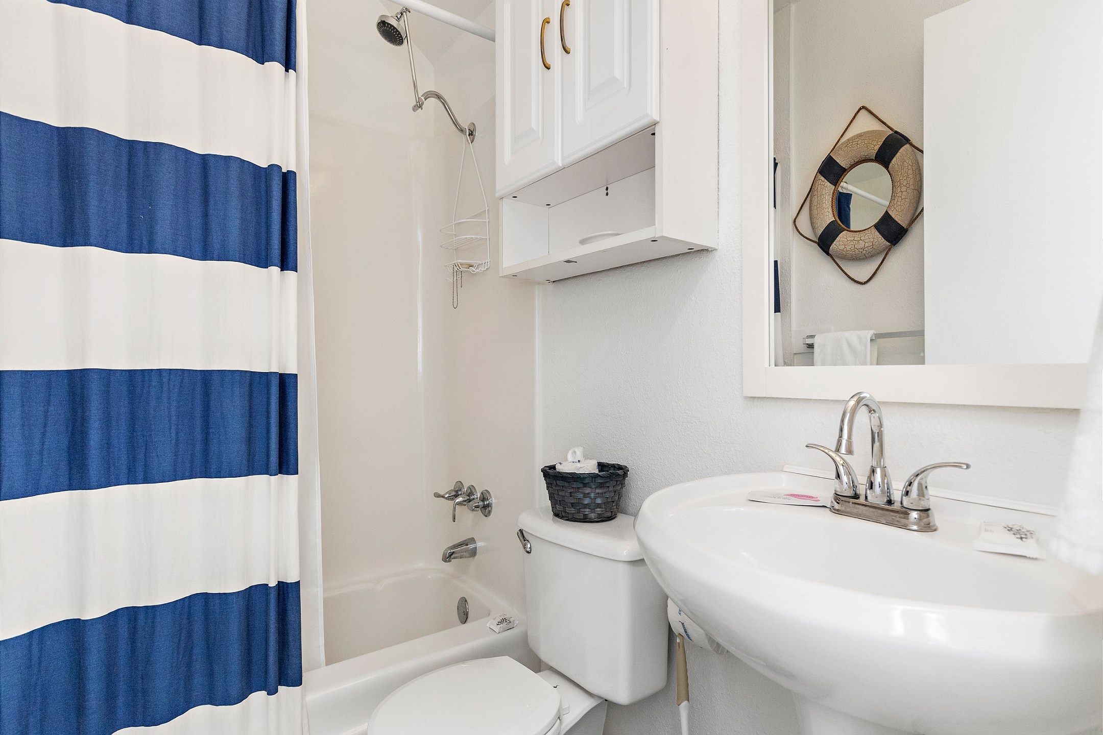 Guest bathroom with tub and shower 
