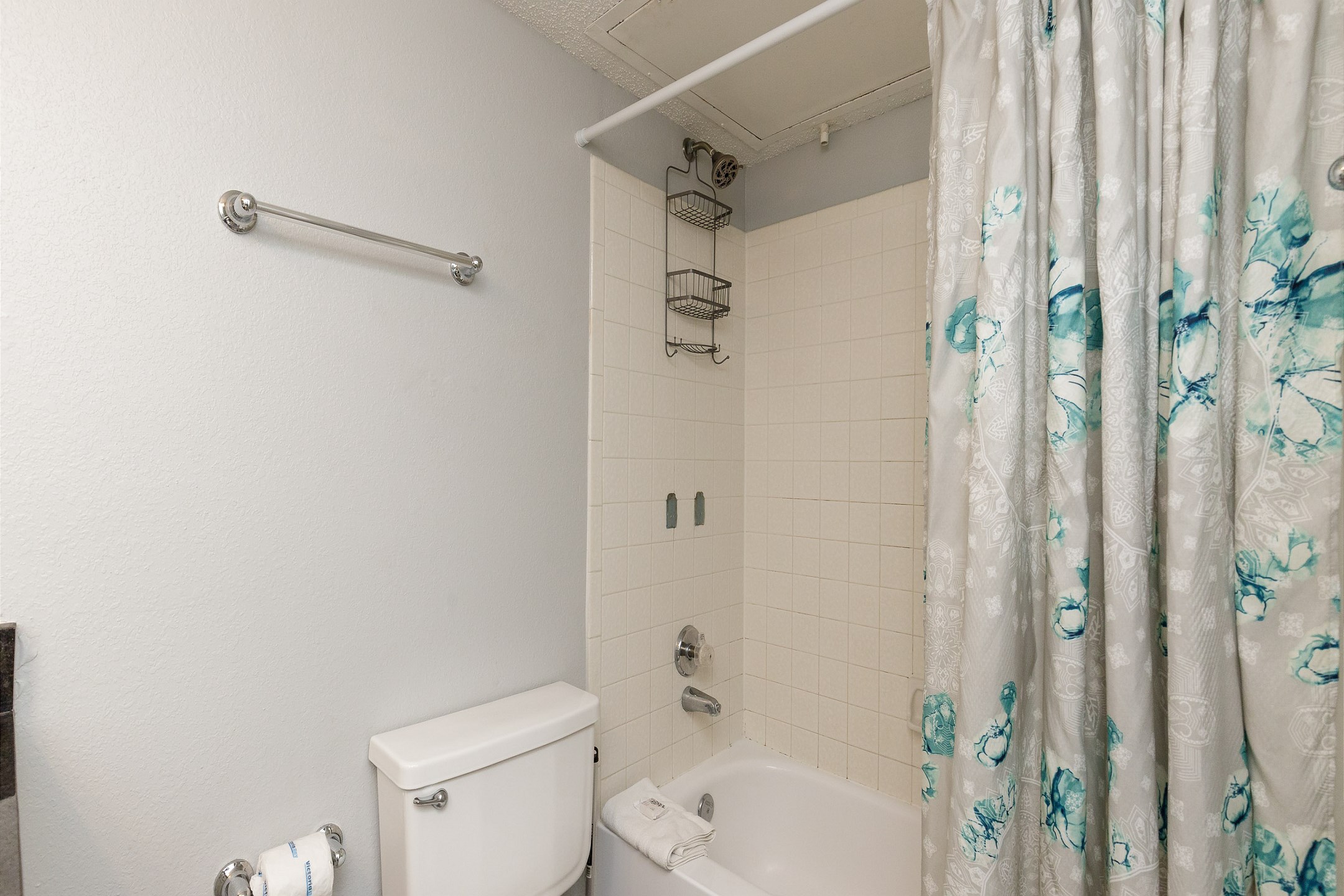 Full bathroom with tub and shower
