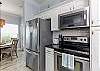 Modern kitchen with stainless steel appliances 