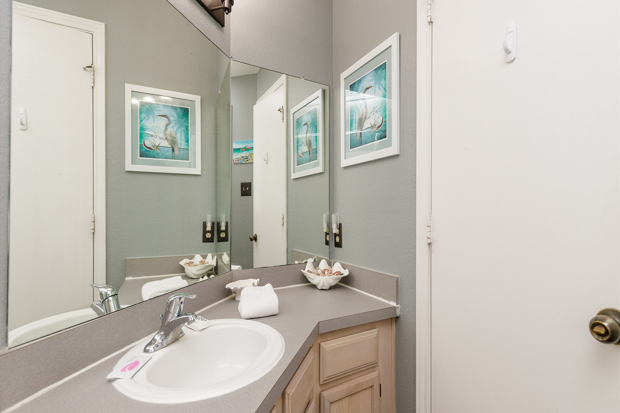 Attached, guest bathroom with tub and shower 