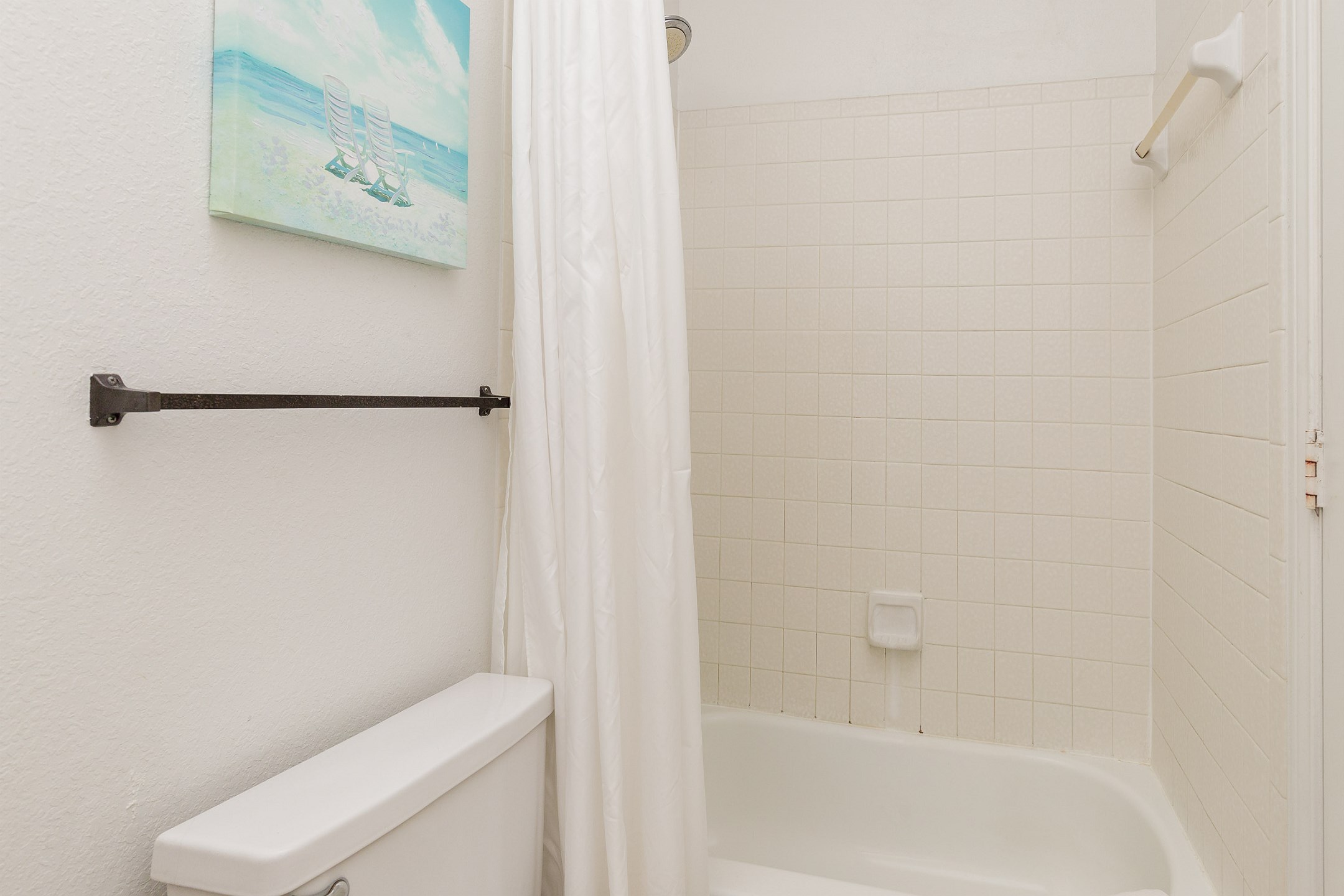 Master bathroom with tub and shower