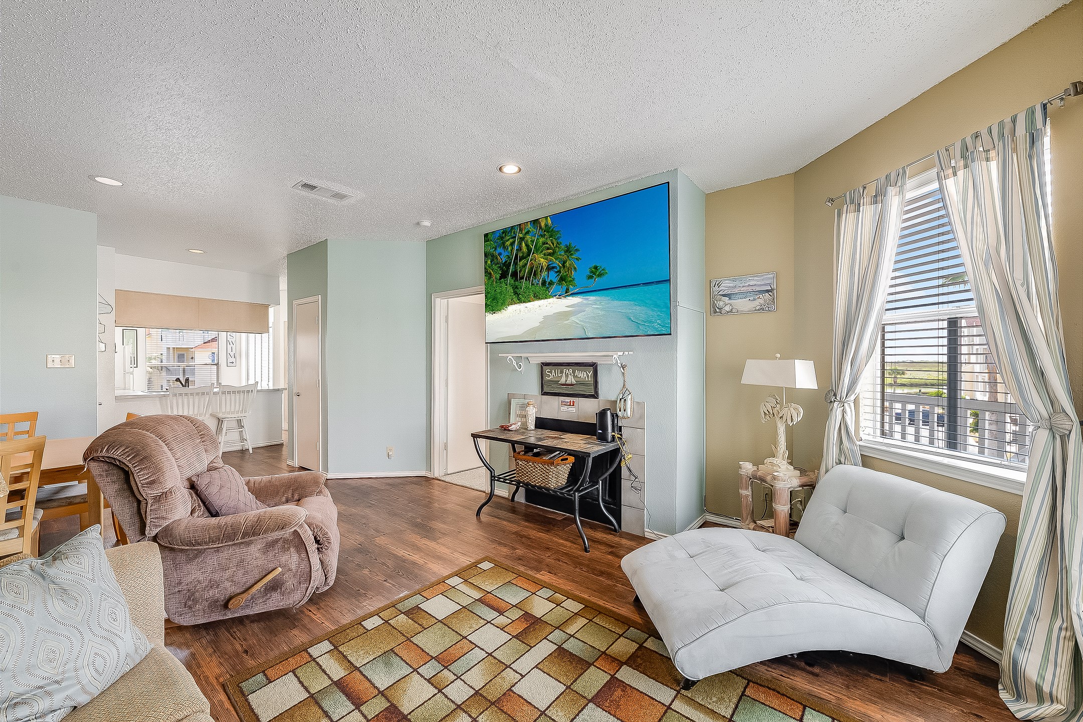 Enjoy the flat screen TV while you relax on the couch or sit at the table for a meal 