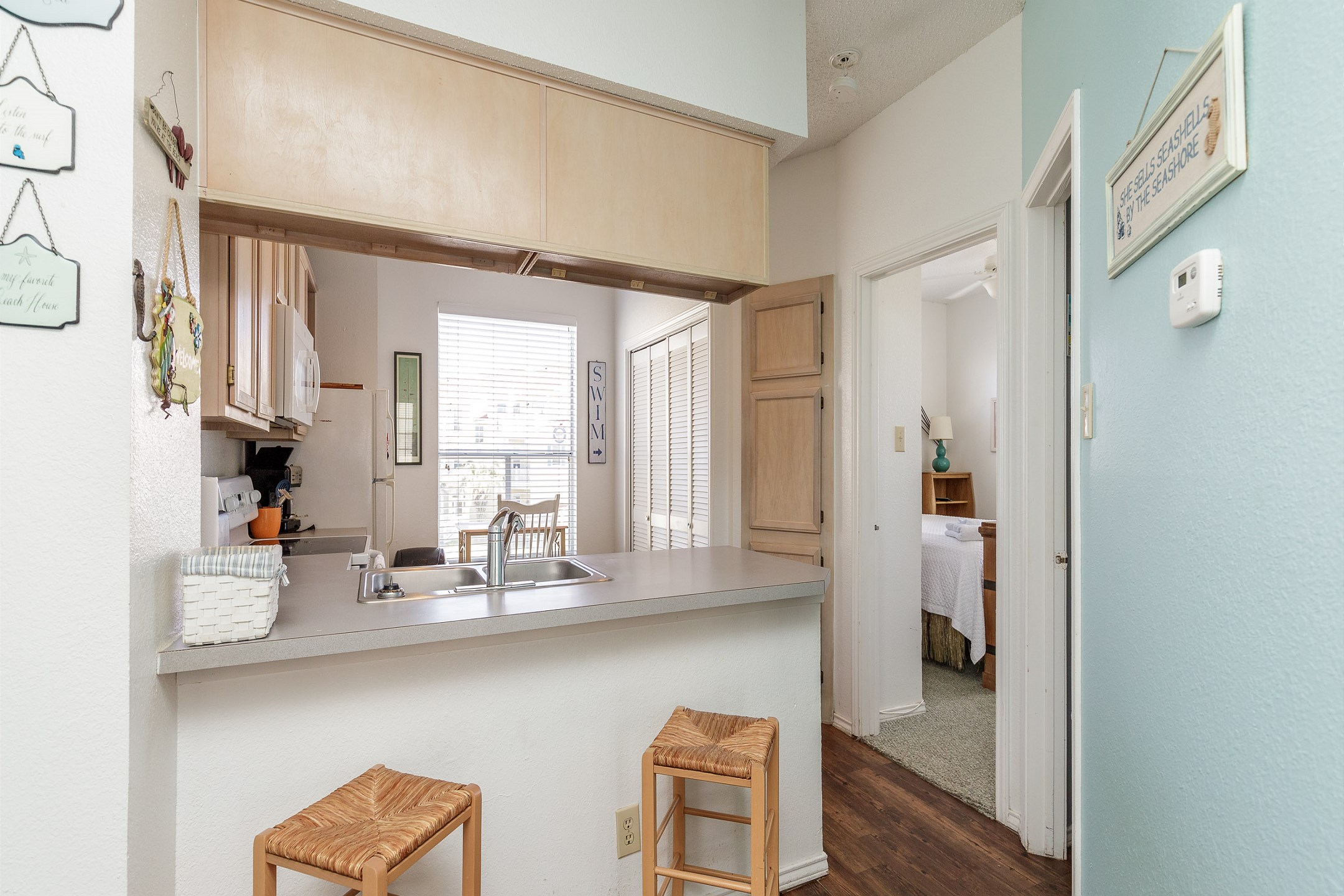 Kitchen area with breakfast bar, seating for two 