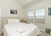 Fourth bedroom on third floor with queen size bed