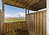 Private patio off the first floor master bedroom with easy access to the pool and beach walkway