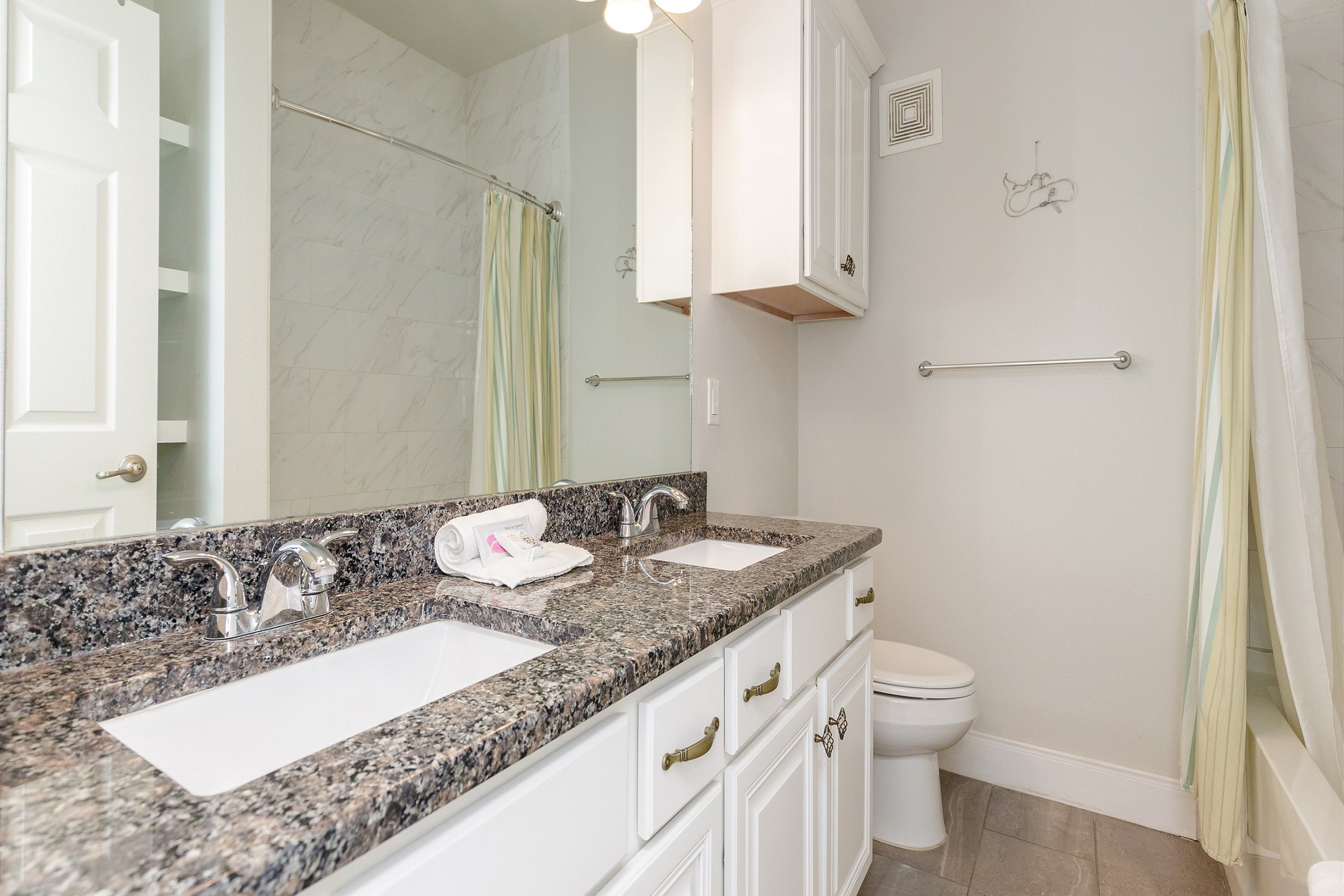 Guest bathroom with tub and shower