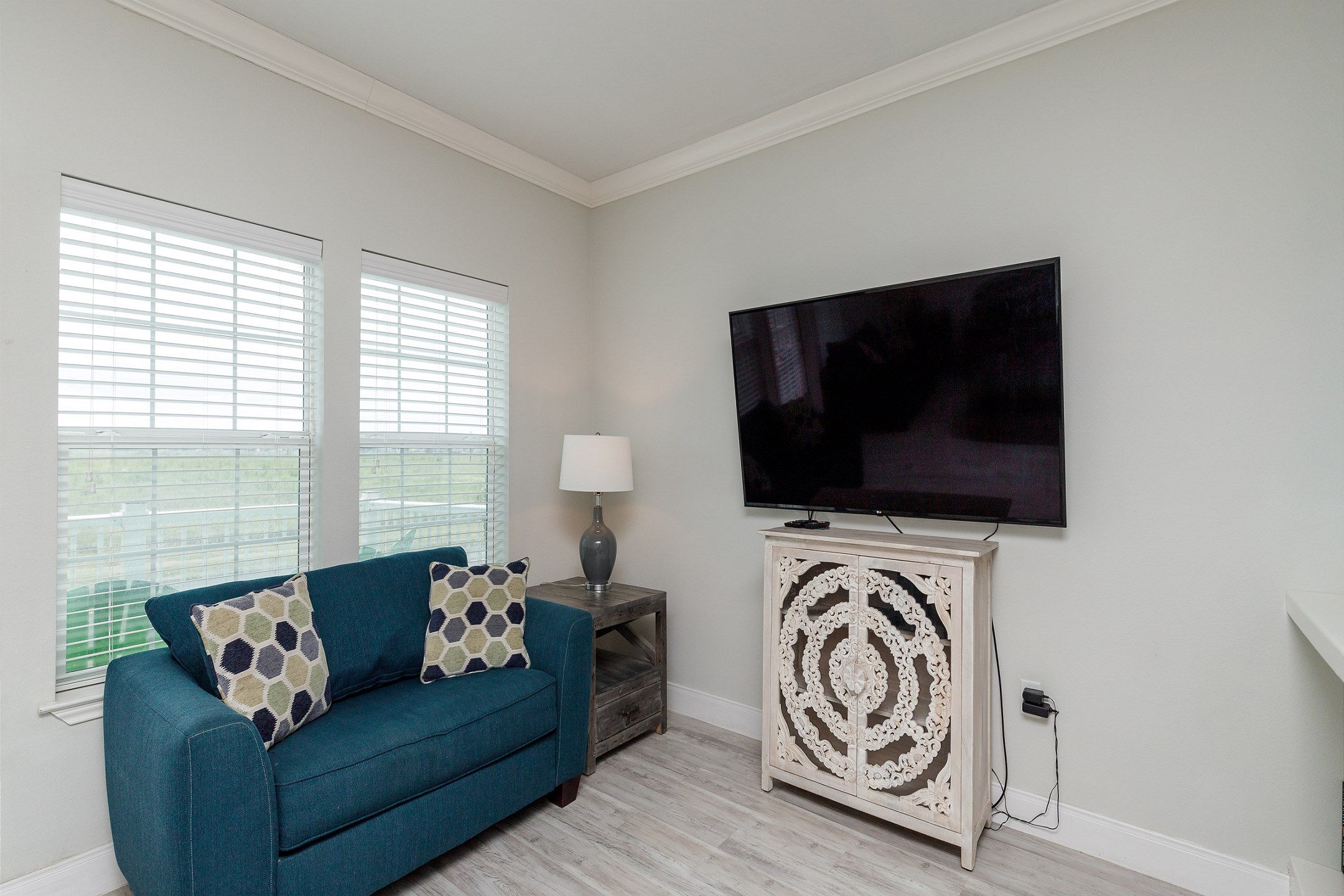 Living area with flat screen TV to enjoy while relaxing on the comfy sofa