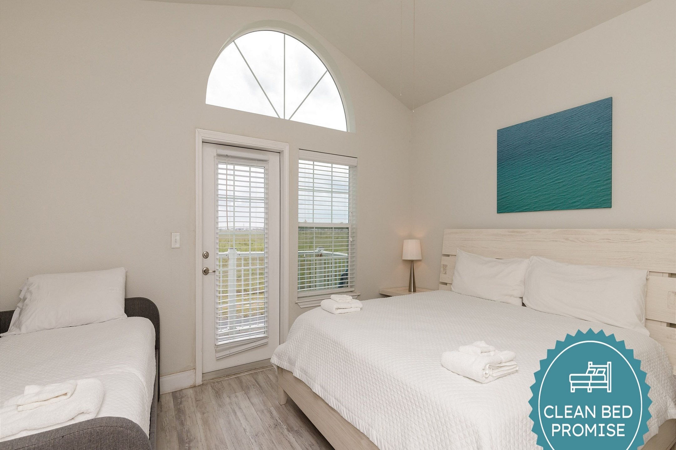 Master bedroom on third floor with king size bed, twin size daybed and twin trundle