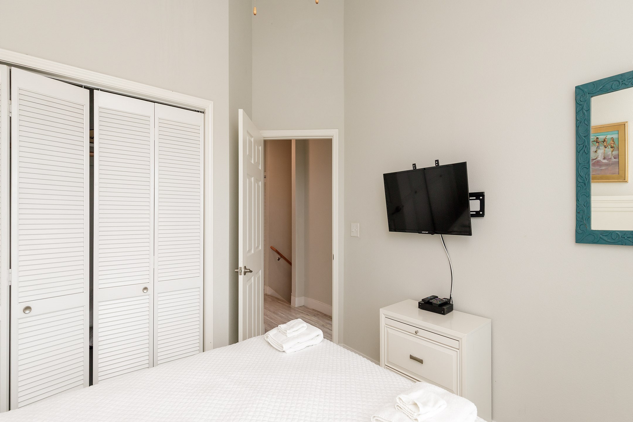 Third bedroom on third floor with queen size bed and flat screen TV