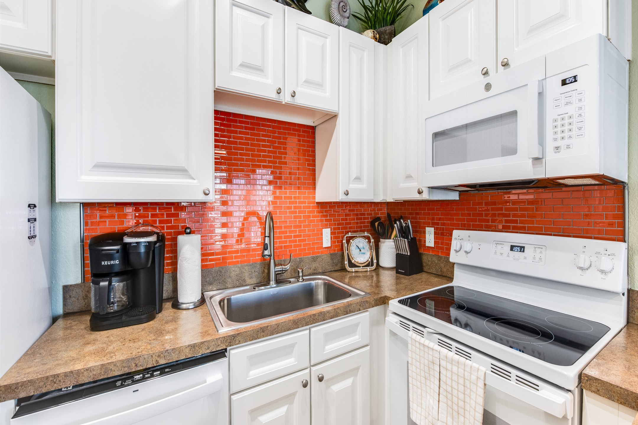 This kitchen is perfect for whipping up quick bites or indulging in culinary adventures during your stay
