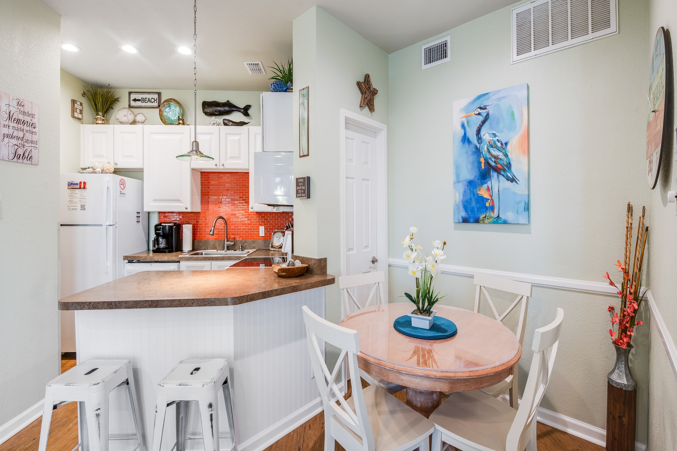 Dining and kitchen space with new seating for six