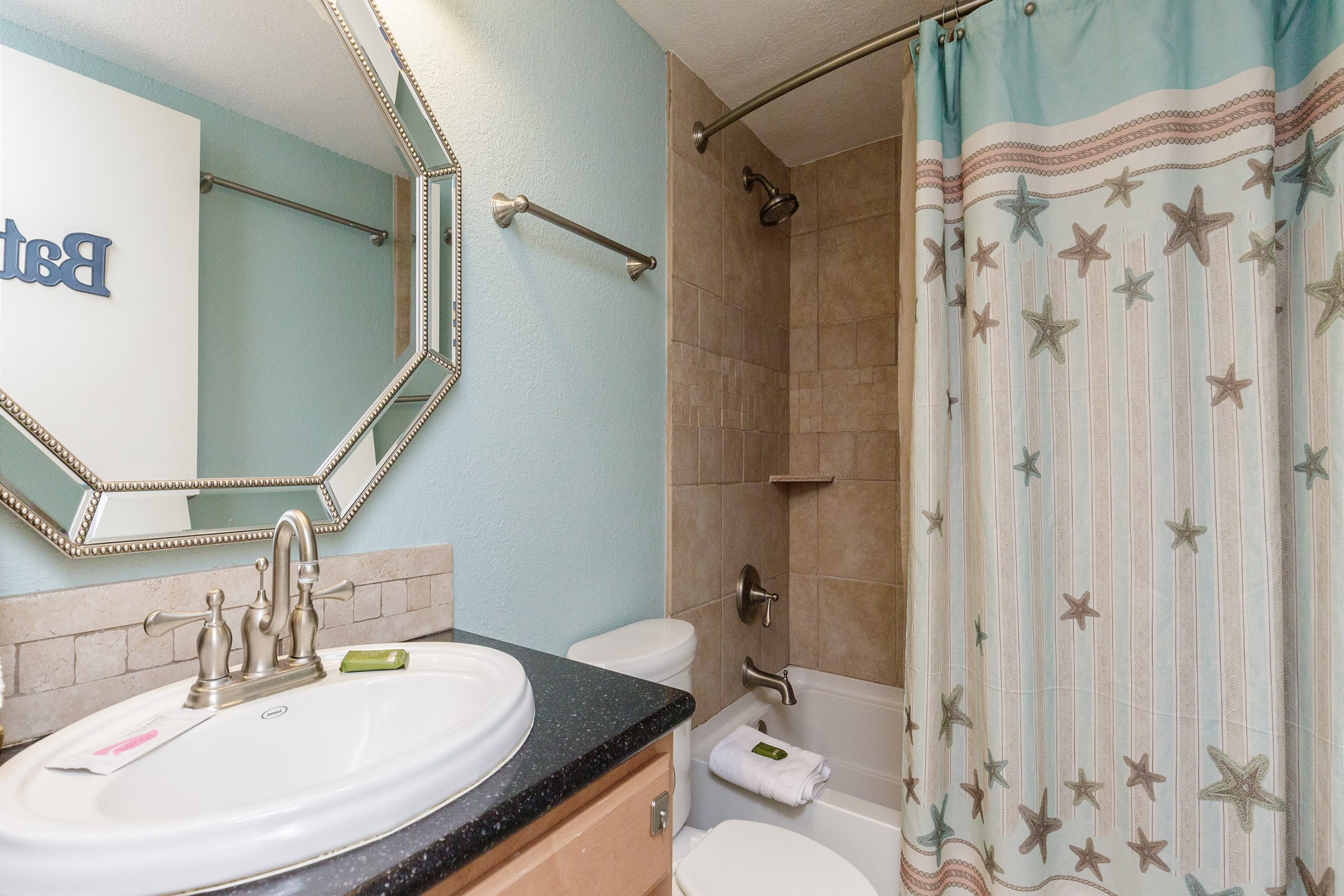 Guest bathroom with tub/shower combo