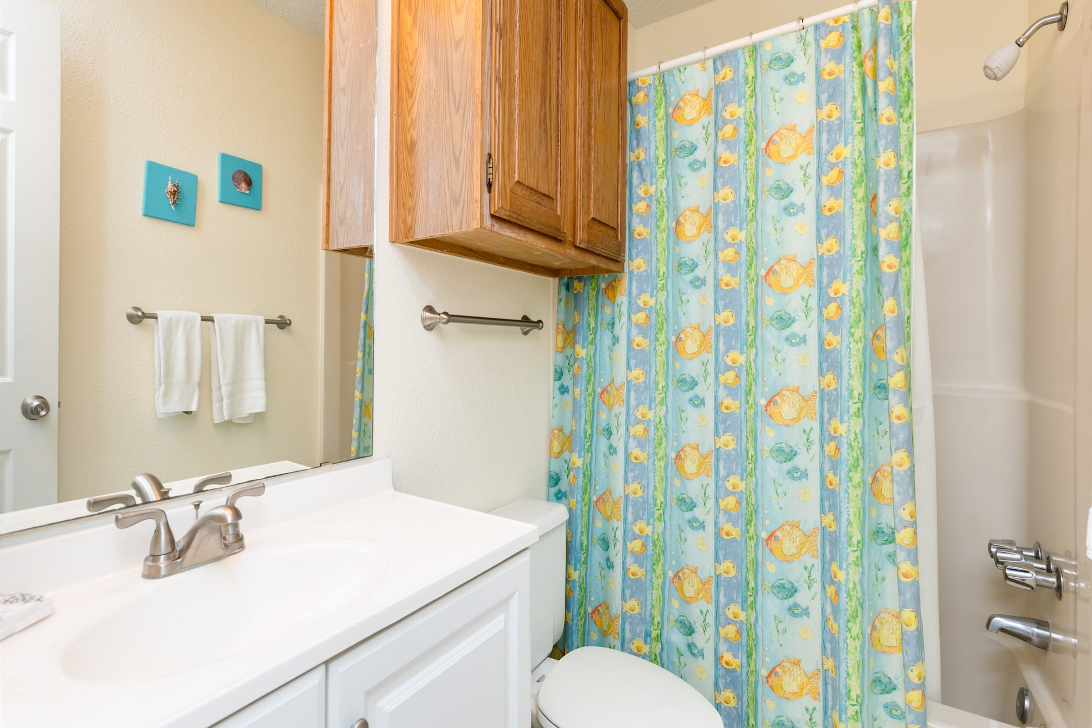 Guest bathroom with tub and shower combo