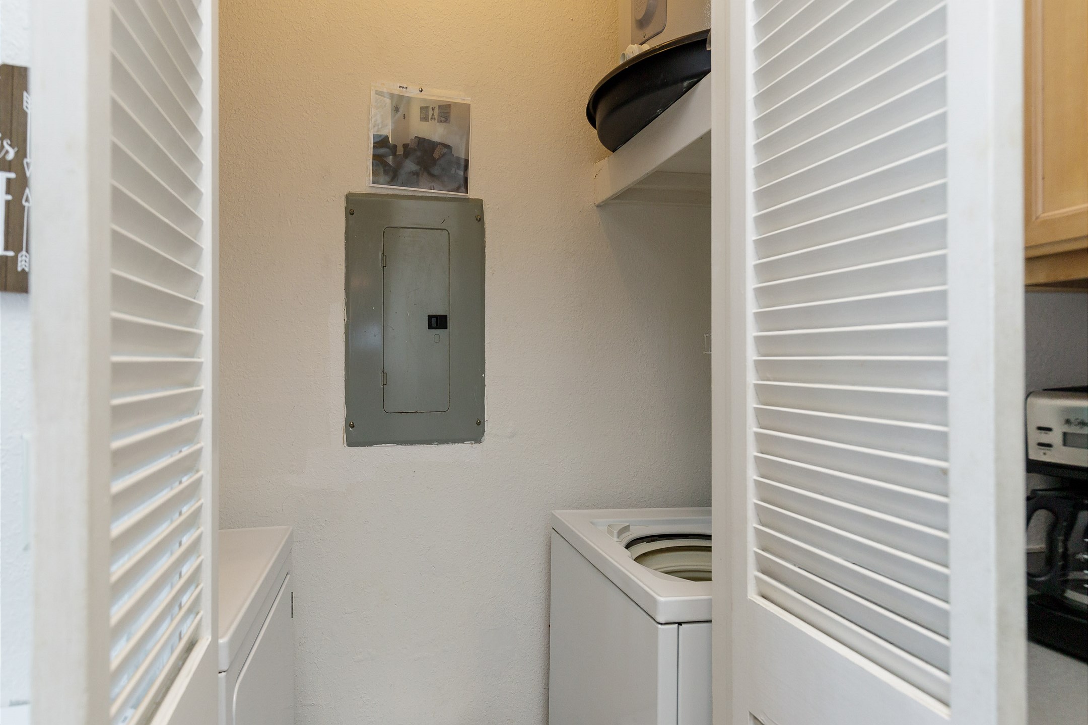 Washer and dryer conveniently tucked away in kitchen 