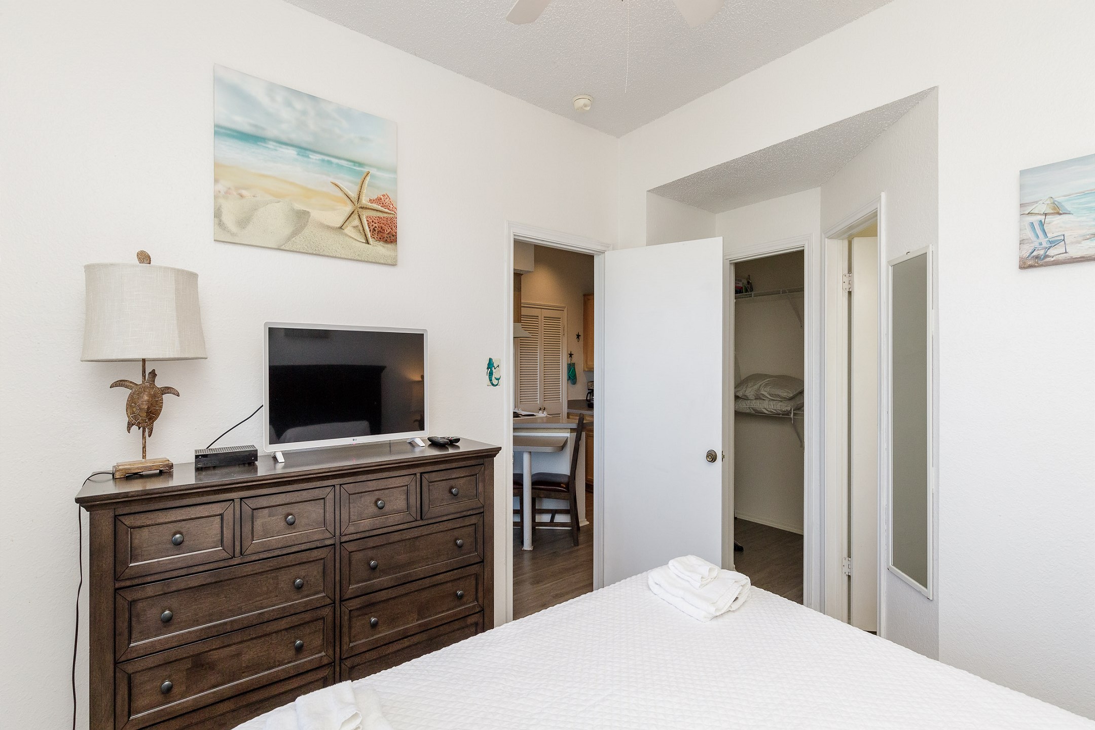 Master bedroom with king size bed and flat screen TV