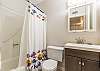 Full bathroom with shower/tub combo 