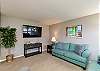 Comfy living area with smart, flat screen TV