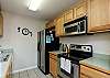 Fully equipped kitchen with stainless steel appliances 